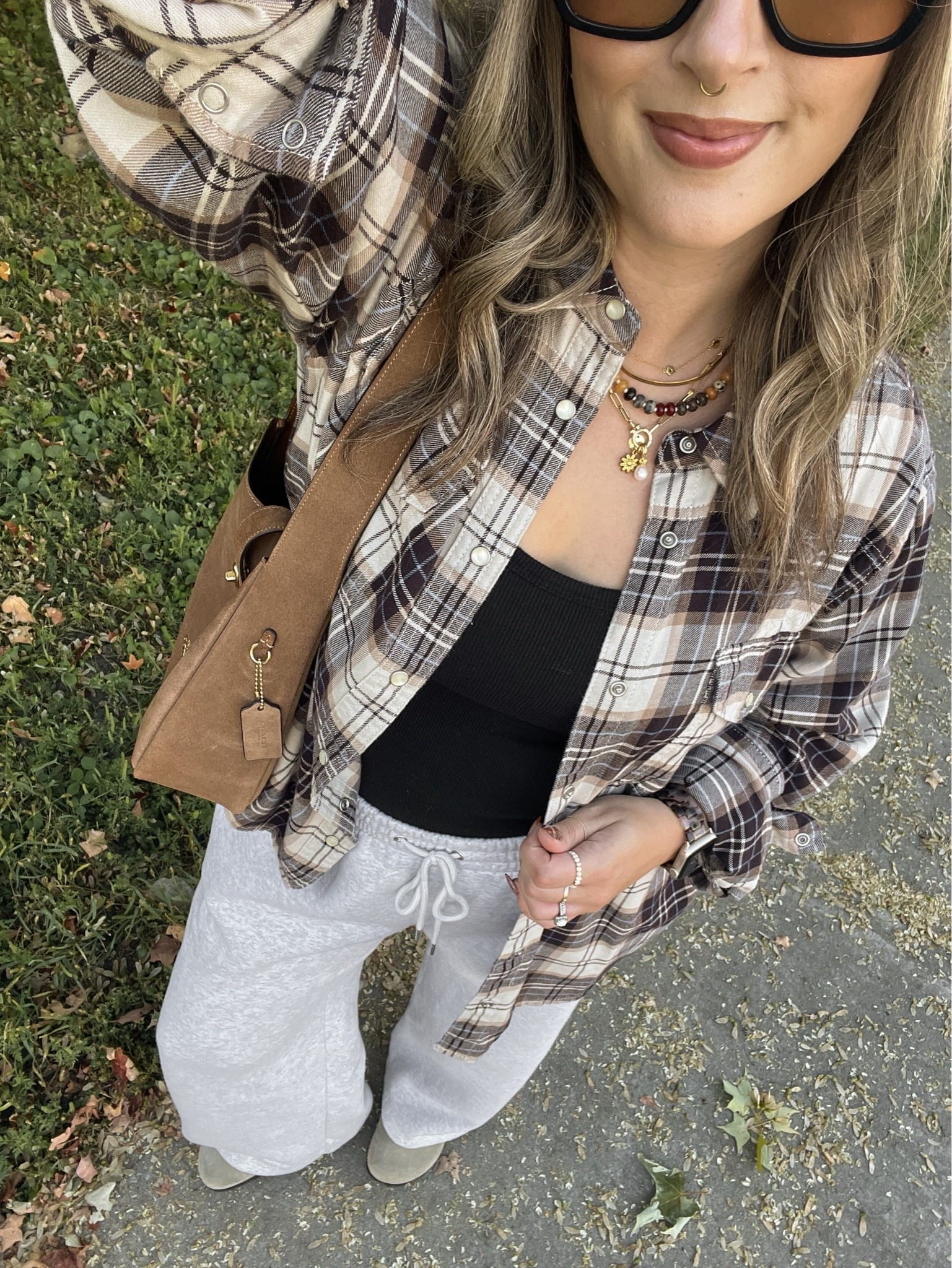 Fall outfit! Wearing M in the bra free tank, L in the wide leg sweatpants (could have done M). Sized up to XL in the plaid flannel shirt for an oversized fit. I’m a 9.5-10 and wear a 40 in the Birkenstock clogs

#LTKfall #LTKsale #LTKstyletip