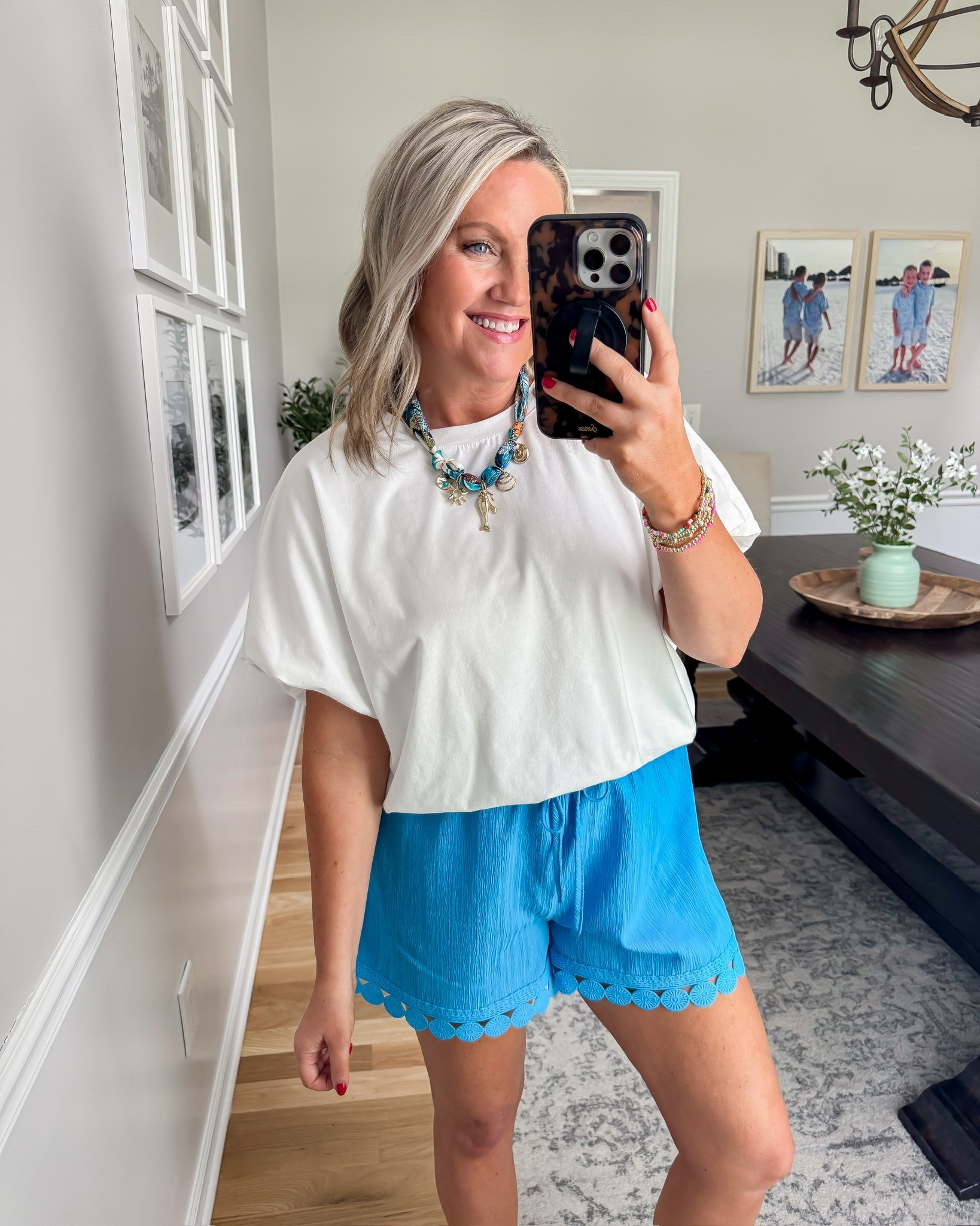 These bright blue lace-trim shorts are exactly what I want to wear when it’s still blazing hot outside but I’m tired of basic denim shorts. The lightweight flowy fabric and drawstring waist keep them comfortable, and I love letting the color do all the work with a simple white tee.

blue shorts, lace trim shorts, casual outfit, summer style, lightweight shorts, drawstring shorts, colorful outfit, hot weather outfit, everyday style, lovelylifestyling

#LTKootd #LTKdayinmylife #LTKSeasonal
