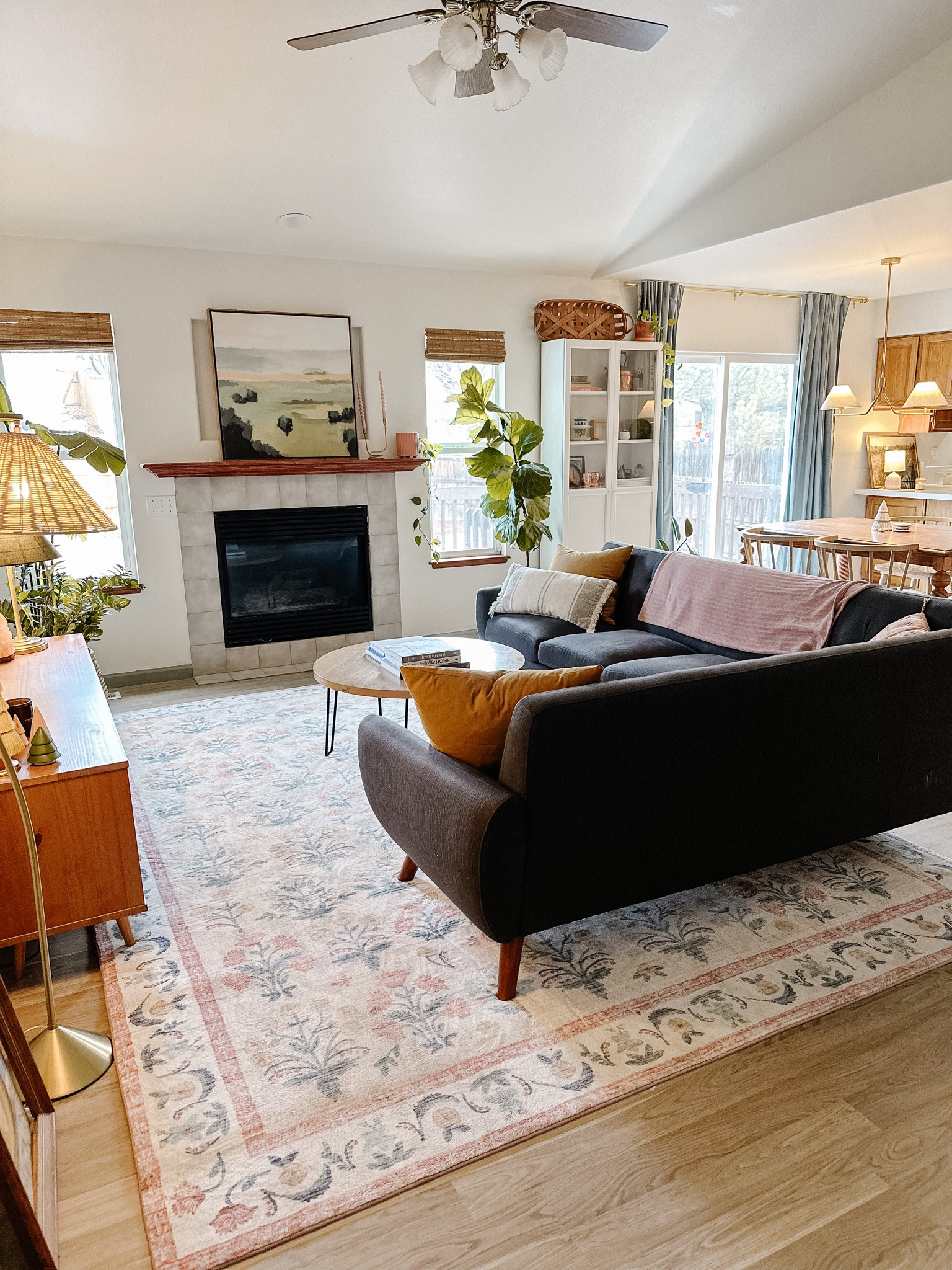 We’re making this house a home one fun decision at a time. We be boring! (Looking at you, fireplace. One of these days we’re coming for you.) 

We got this Eden Rifle Paper Co x Loloi rug in the fall and it’s soooooo soft. The perfect rug for our family and to add a little joy to this room as we slowly make it our own  

#LTKhome