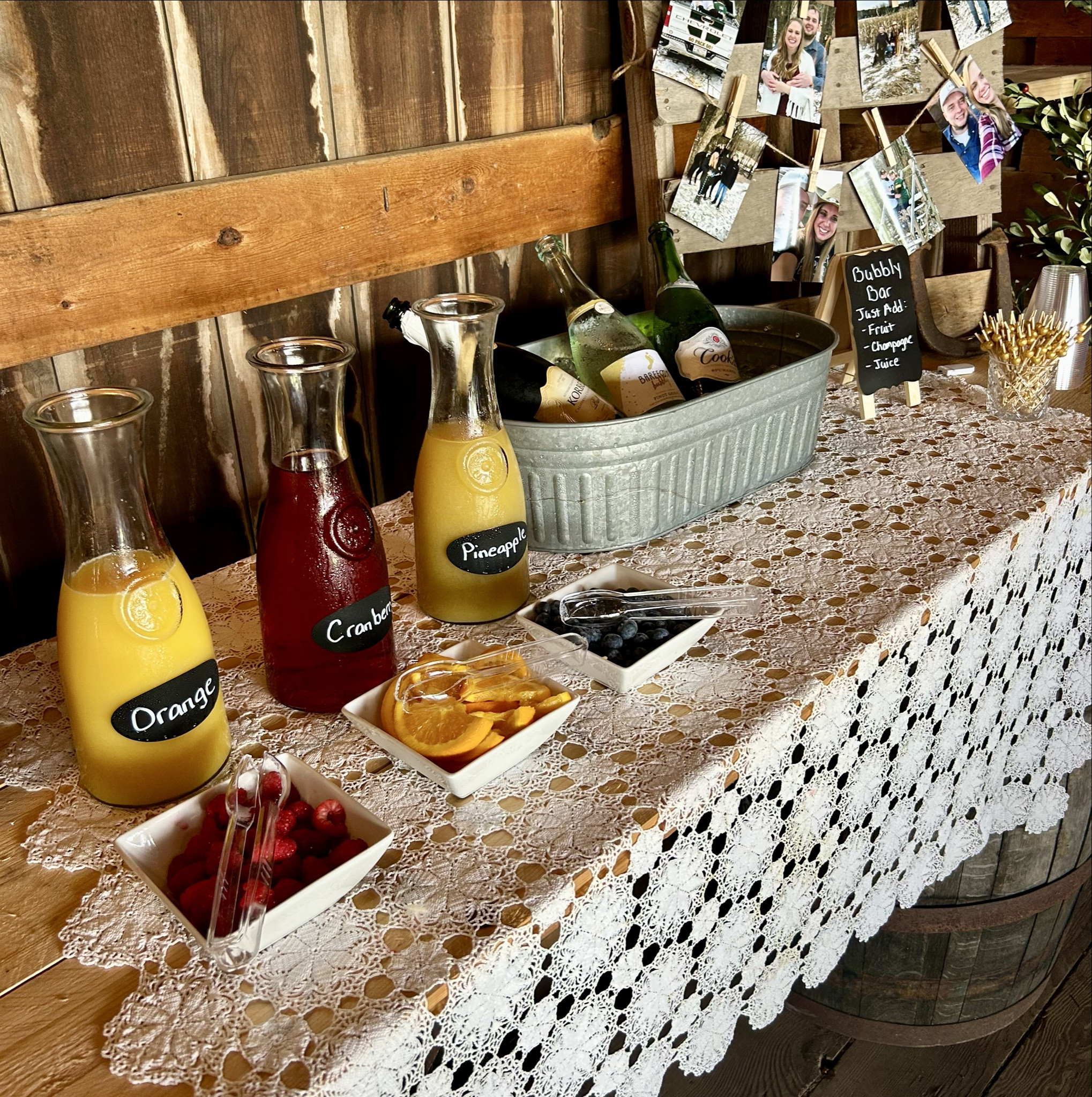 I helped host my soon to be sister-in-law’s bridal shower a few weekends ago and this ‘mimosa bar’ was a hit! I bought a few carafes at a great price for the juice and added chalkboard stickers for the labels. Three inexpensive white dishes worked great for the fruit…and a galvanized bucket to chill the champagne added a rustic touch! An easy and inexpensive hosting idea…everything I used linked here! 