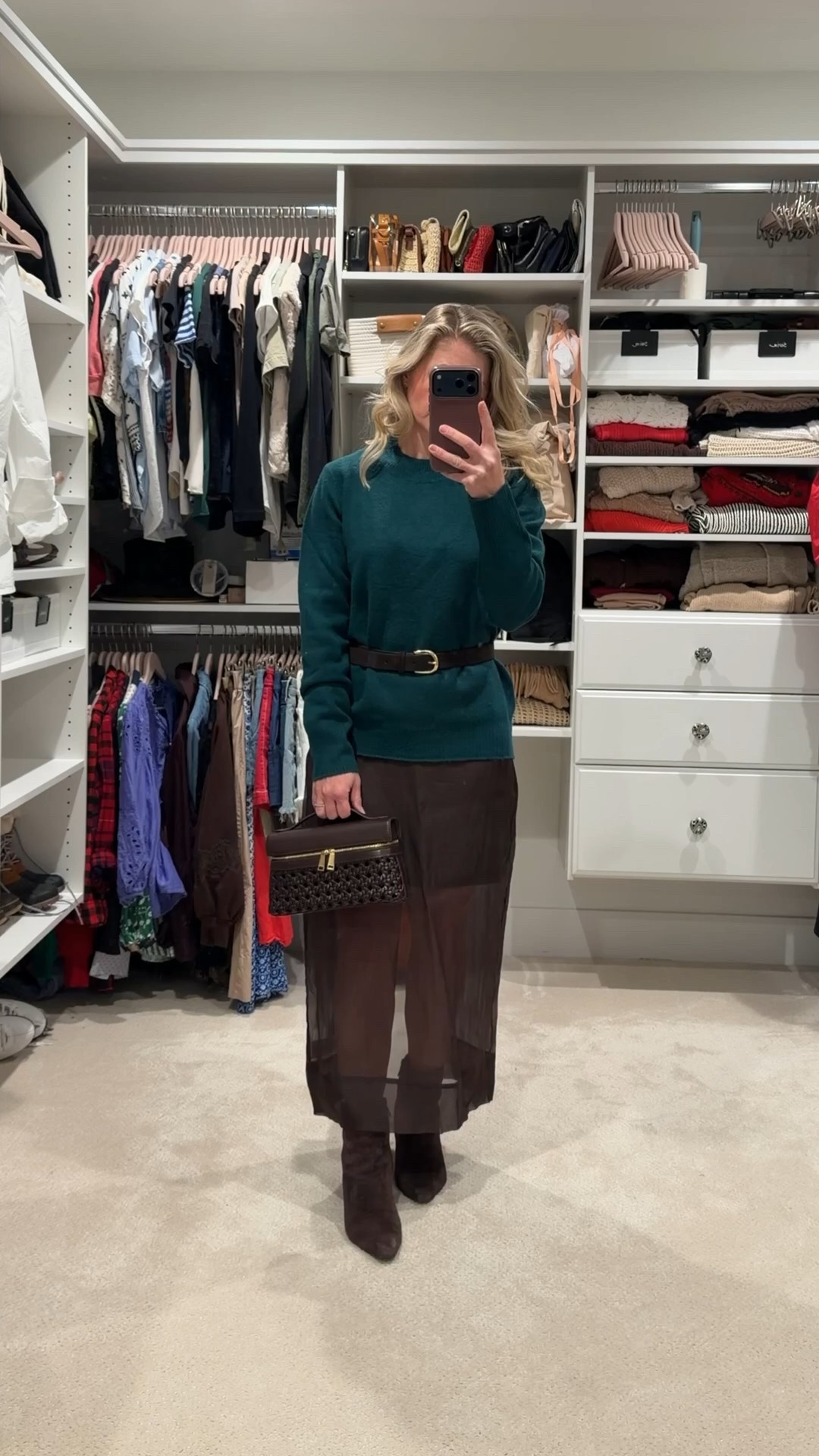 Taking a warm weather skirt into winter is easy with a few simple swaps. I layered this sheer brown skirt with tall suede boots and a cozy forest green sweater, then added a belt to define the waist and pull the look together.

For frigid days, just add opaque tights underneath for extra warmth without losing the flowy silhouette.

Styling tip: when transitioning pieces between seasons, keep the color palette rich and the textures cozy to make lighter fabrics feel intentional for winter. 🤎✨

#LTKootd #LTKHoliday #LTKGiftGuide