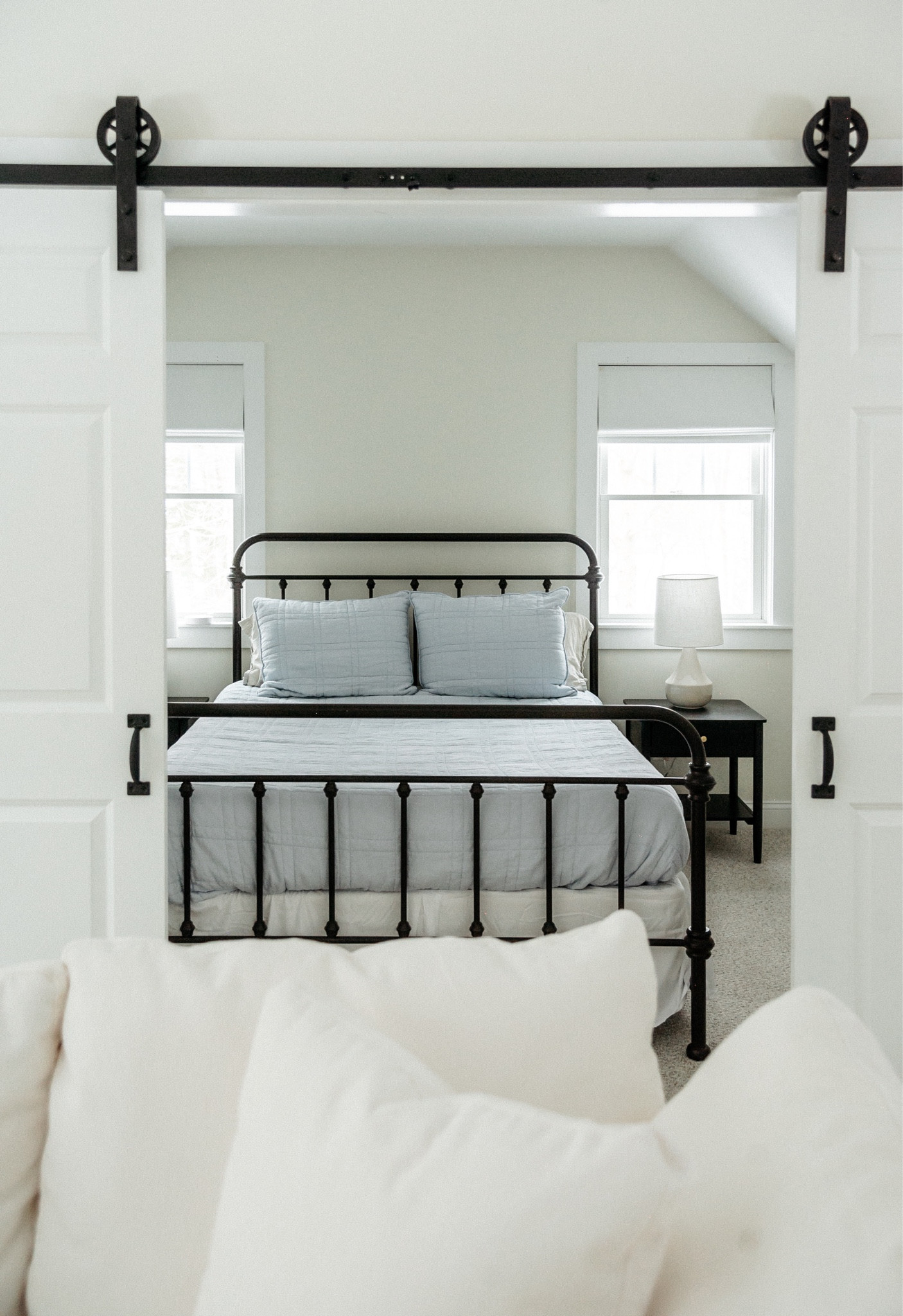 Looking for a light, bright and oh-so-calming guest room design? We love this blue and white bedroom from our Surf Road Project No. 55

#LTKhome