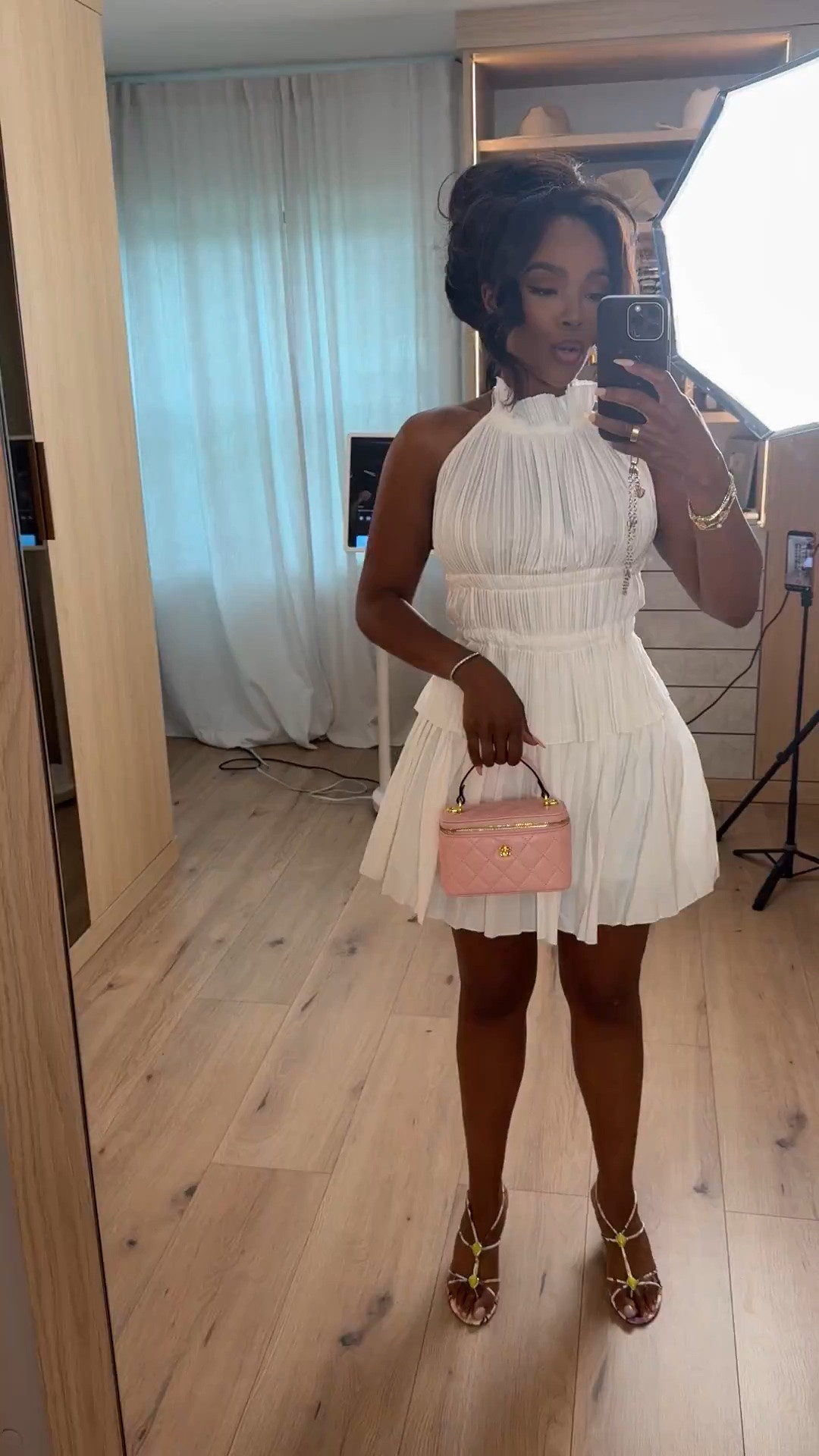 Hi Babes!

This white pleated mini dress is giving luxury vacation energy. The high neckline, flattering cinched waist, and flowy skirt make it one of those pieces that feels timeless, feminine, and effortlessly expensive.

Where to wear this:
• Bridal shower
• Resort vacation
• Birthday dinner
• Summer date night
• Graduation celebration
• Champagne brunch with the girls

Everything is linked below.

xx Kira | IG: KirasFashionFinds

34D - 27 - 40 • Size Small or 4

Follow me on Instagram and YouTube @kirasfashionfinds