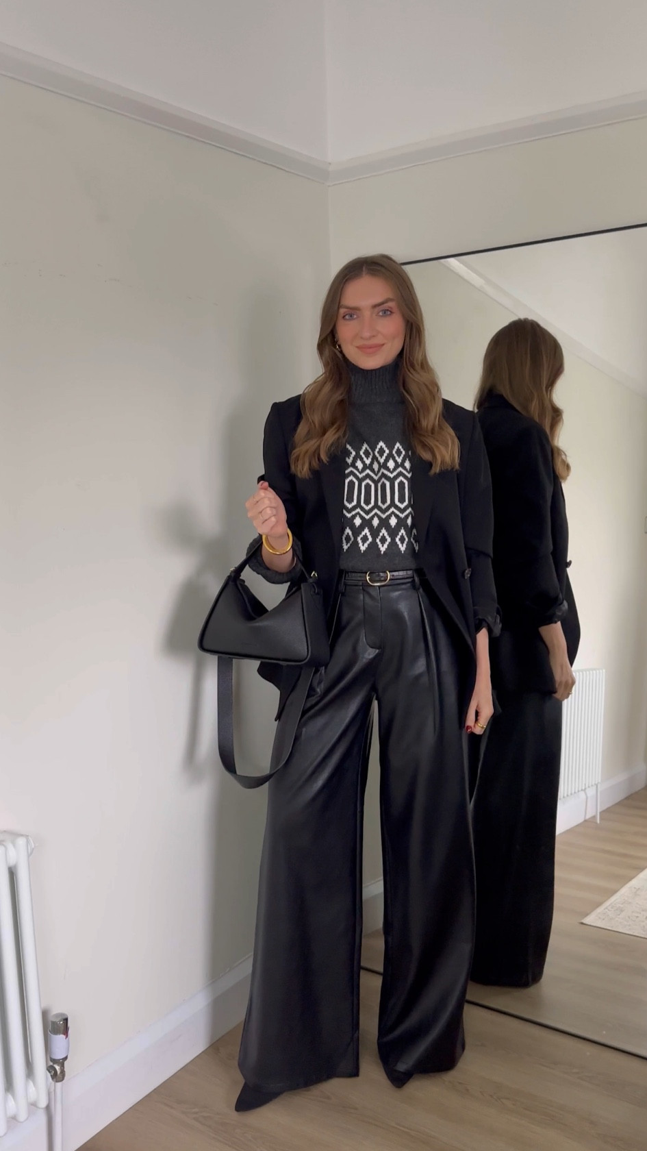 Christmas Jumper styling

Wearing a small in the H&M dark grey fair-isle jumper
A size 8 in the black faux leather wide leg trousers from Karen Millen, exact and similar linked. These also come in petite. I'm 5ft 6 for an idea of the length, I'm wearing the reg in these
My blazer is the Toteme double breasted blazer, bought at a Matches sample sale. I've linked exact and similar 
Gold jewellery 
The Horse ‘clementine’ bag with gold hardware 

Christmas Jumper outfit, Christmas day outfit, festive fashion, winter outfit, leather trousers outfit, evening outfit

#LTKuk #LTKwinter #LTKeurope