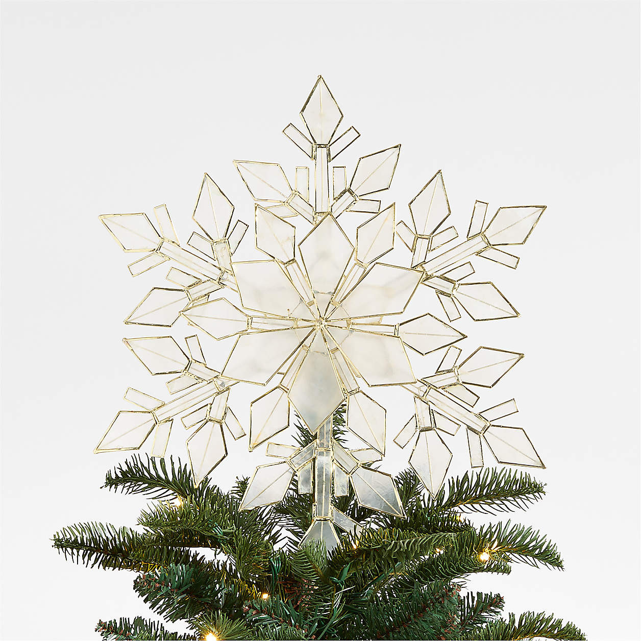 Capiz Shell Snowflake Christmas Tree Topper | Crate & Barrel | Crate & Barrel