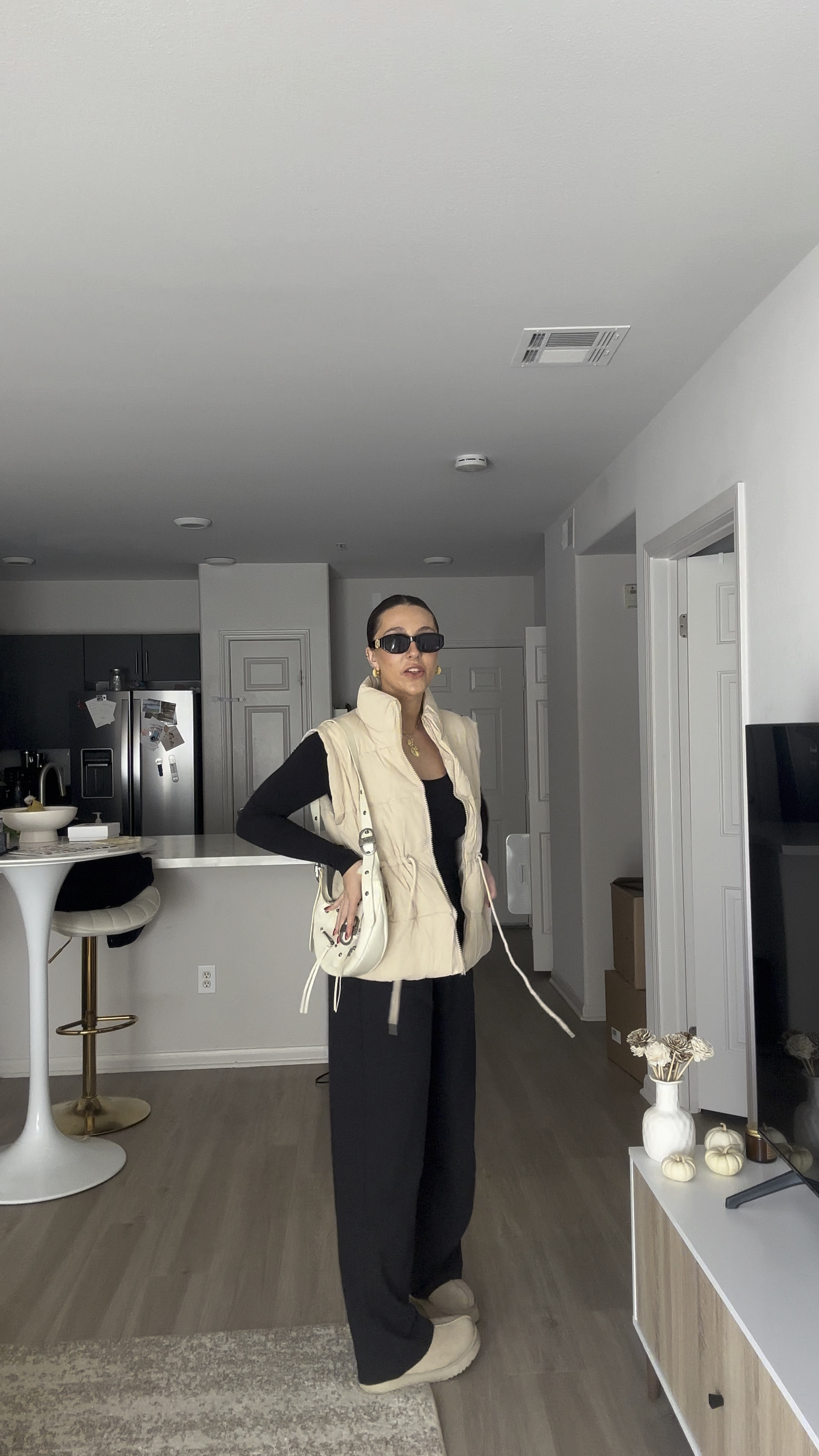 New puffer vest from Amazon! I sized up and got a large for a more oversized look. I’m 5’8 & wearing the Curve love Sloane pant 6 + my UGG Tazz platform lookalikes!! 

#LTKSeasonal #LTKstyletip #LTKfindsunder100