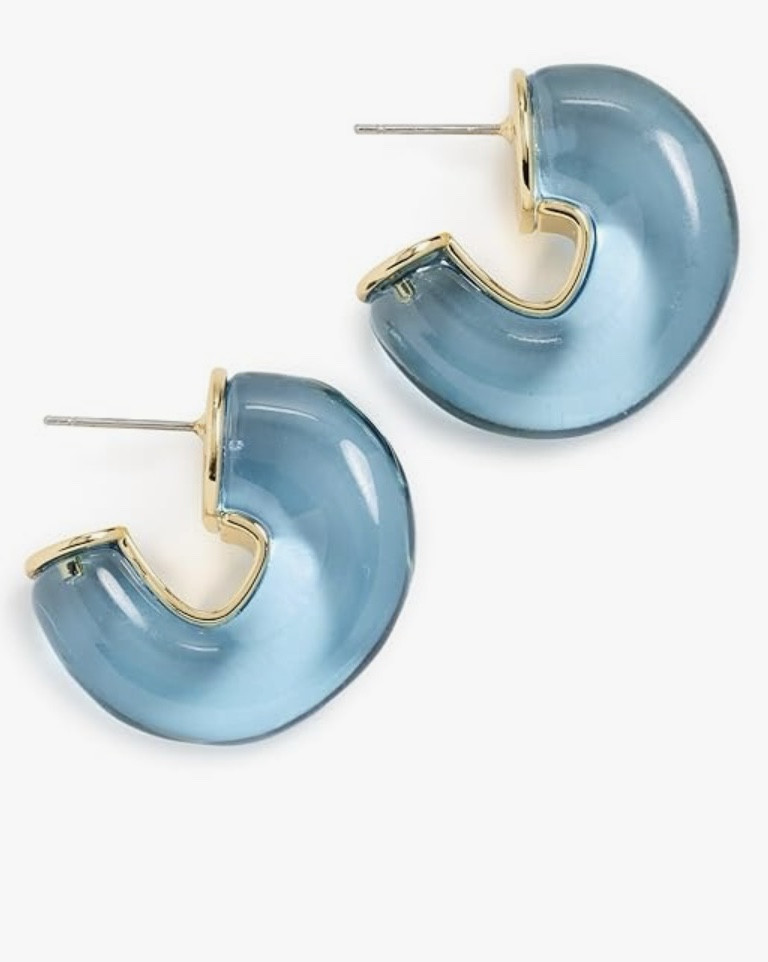Material Metal
Metal type Gold-plated-brass
Gem type Not_applicable
About this item
Transparent acrylic
Post closure
Description
Chunky Hoop Earrings
Product specifications
Brand, Seller, or Collection Name	Lele Sadoughi
Metal stamp	14k
Metal	gold-plated-brass
Material	metal
Gem Type	not_applicable
Setting	other-setting-type
Back finding	Post closure

#LTKParties #LTKU #LTKSaleAlert