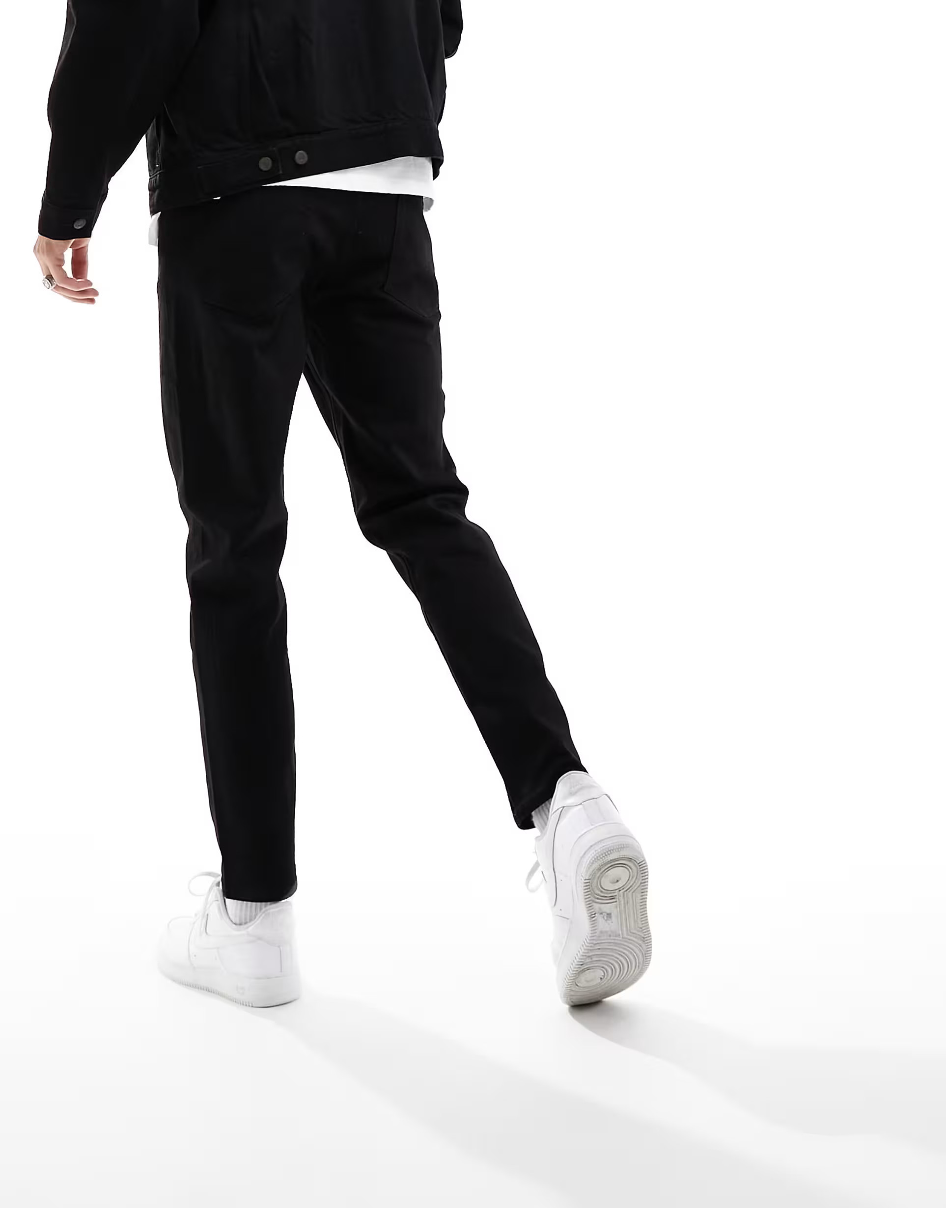 ASOS DESIGN tapered jeans in black | ASOS (Global)