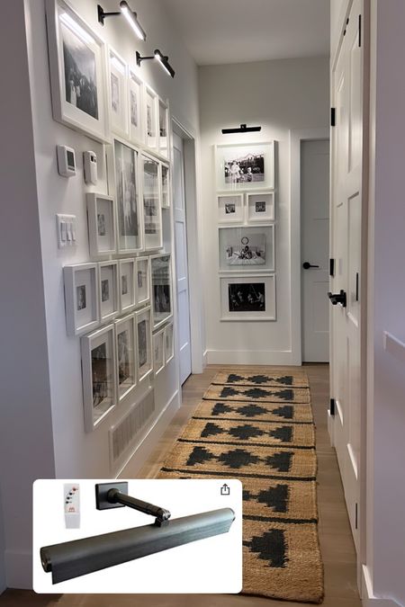 With little to no natural light this hallway needed some wall lights. These rechargeable picture lights are super easy to install and recharge. What do you think of this little hallway update? #LauraMayHome 
.
.
.


#LTKhome #LTKHoliday #LTKfamily