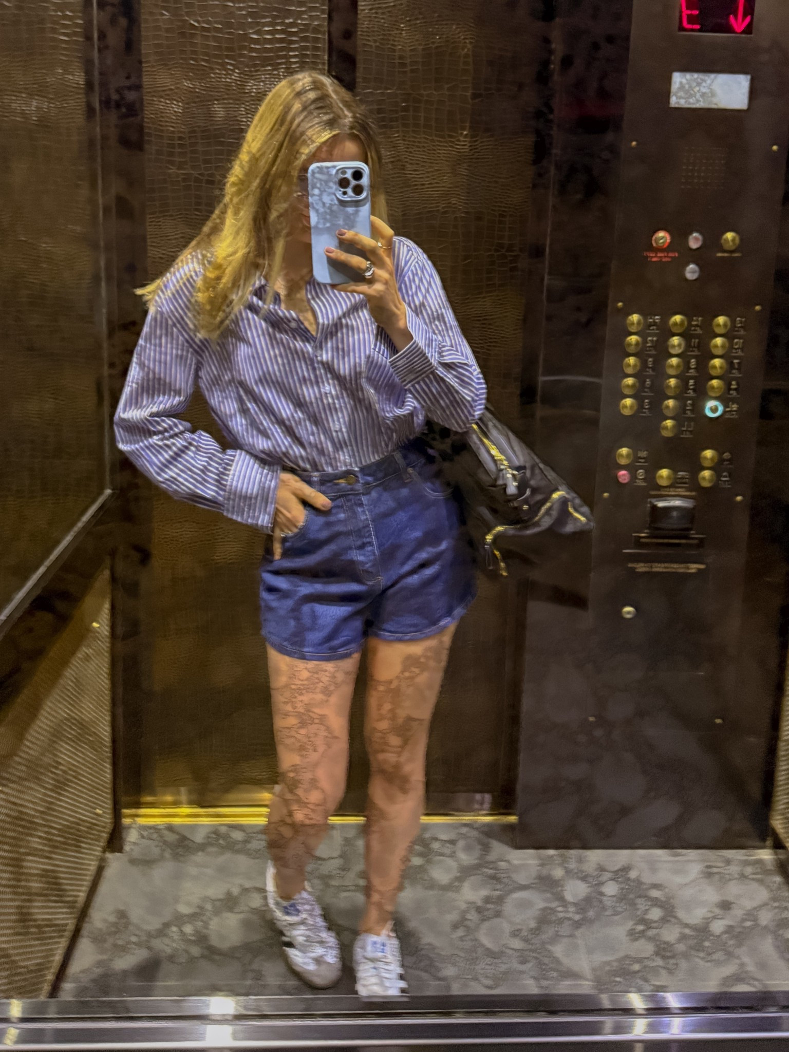 going a little retro for a workday in Brooklyn 🤍 i kept it classic with a crisp striped button-down, dark denim high-waist shorts, and my favorite vegan Adidas Sambas. It’s giving effortless, timeless style with a hint of sporty edge.
	•Wearing size small in both pieces - shorts are structured but comfy
	•Dark denim gives a retro feel that dresses up a casual look
	•Striped button-down is oversized + easy to tuck or wear loose
	•Vegan Sambas = my everyday go-to sneakers 👟
Linked the full look here 🤍
#classicoutfit #workfromhomeoutfit #everydaystyle #casualoutfit #newyorkcityoutfit 


#LTKSeasonal #LTKTravel #LTKShoeCrush