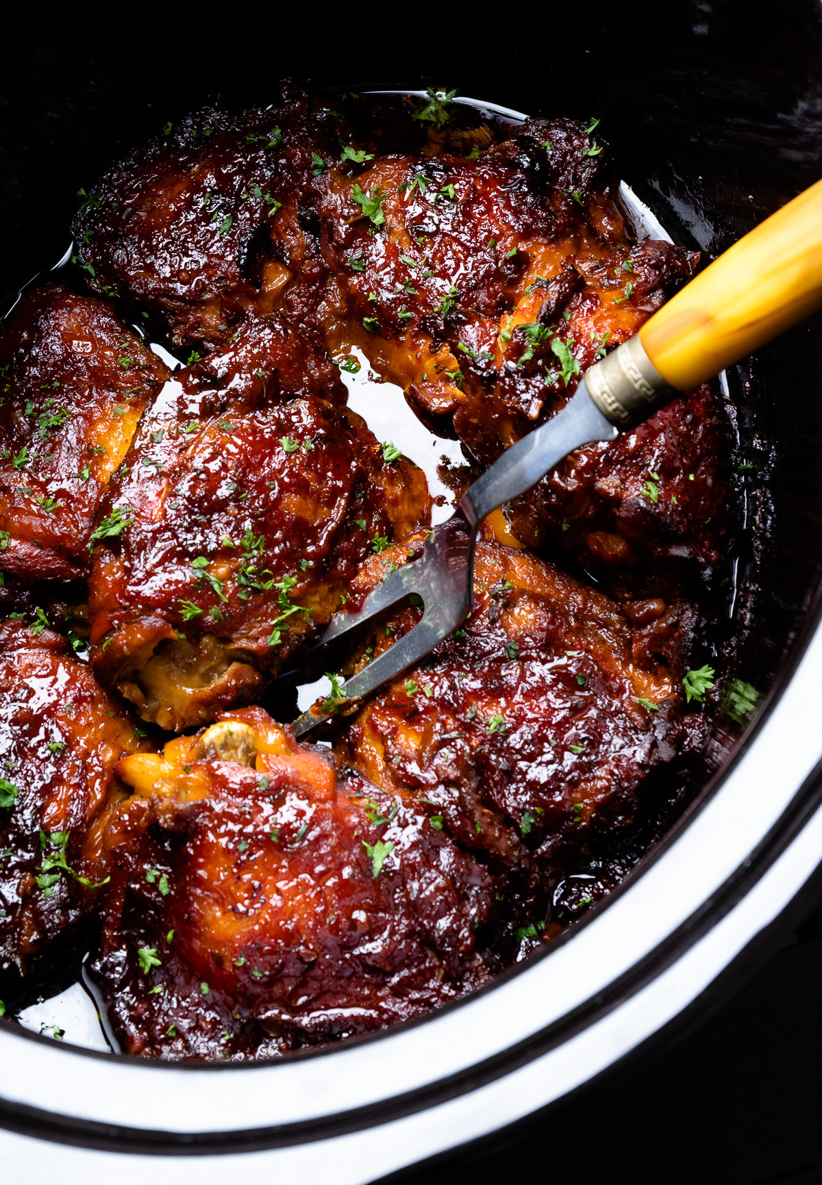 Tender, juicy chicken thighs slow-cooked to perfection with just a few simple ingredients!
Find my favorite slow cookers and kitchen must-haves for easy weeknight dinners. 

 