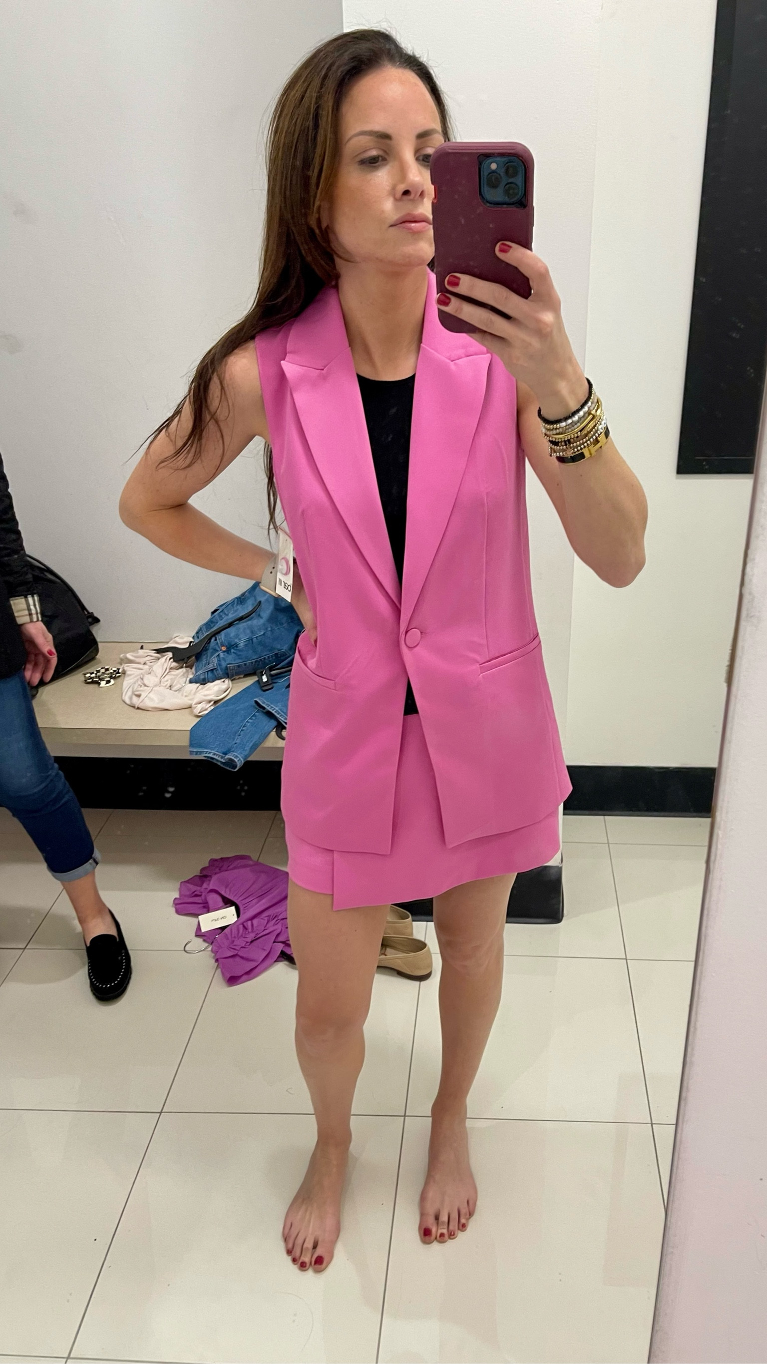 Obsessed with this hot pink blazer and skort suit set from Macys. Easily wear to the office or dress it up for date night. Has one button in the front. Mini skort and single button blazer both come in black and white too. I am wearing a black high neck bodysuit under it. Easily pair with other pieces from your closet. Macy suit, Bar III suit, office wear, workwear

#LTKfindsunder100 #LTKSeasonal #LTKworkwear