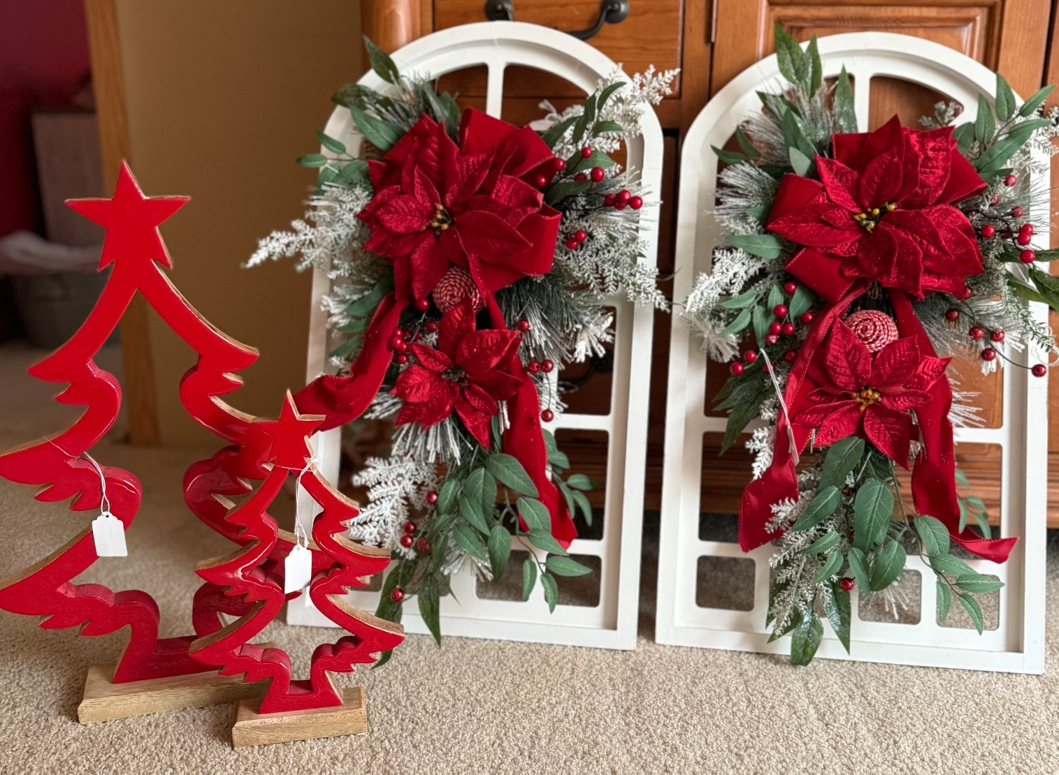 Holiday hosting starts with cozy decor! I found these festive pieces at a local Christmas open house yesterday. They will give my space the perfect warm welcome for guests. Mixing natural greenery, pops of red, and wood accents making everything feel homey and inviting. 

#LTKHome #LTKHoliday #LTKSeasonal