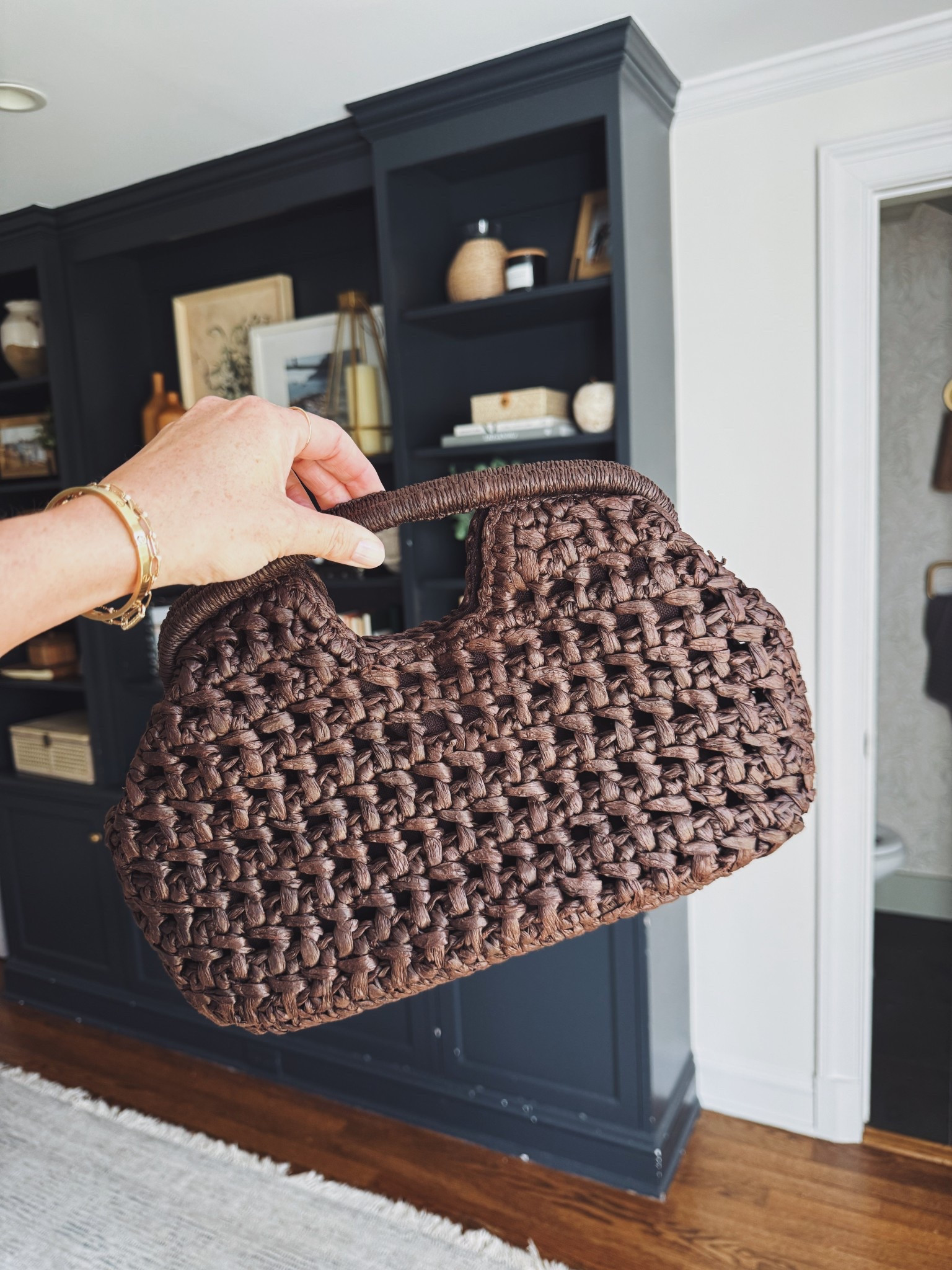 Chocolate brown Woven clutch - great medium size if you you prefer something over tiny bags 

vacation accessories #ad