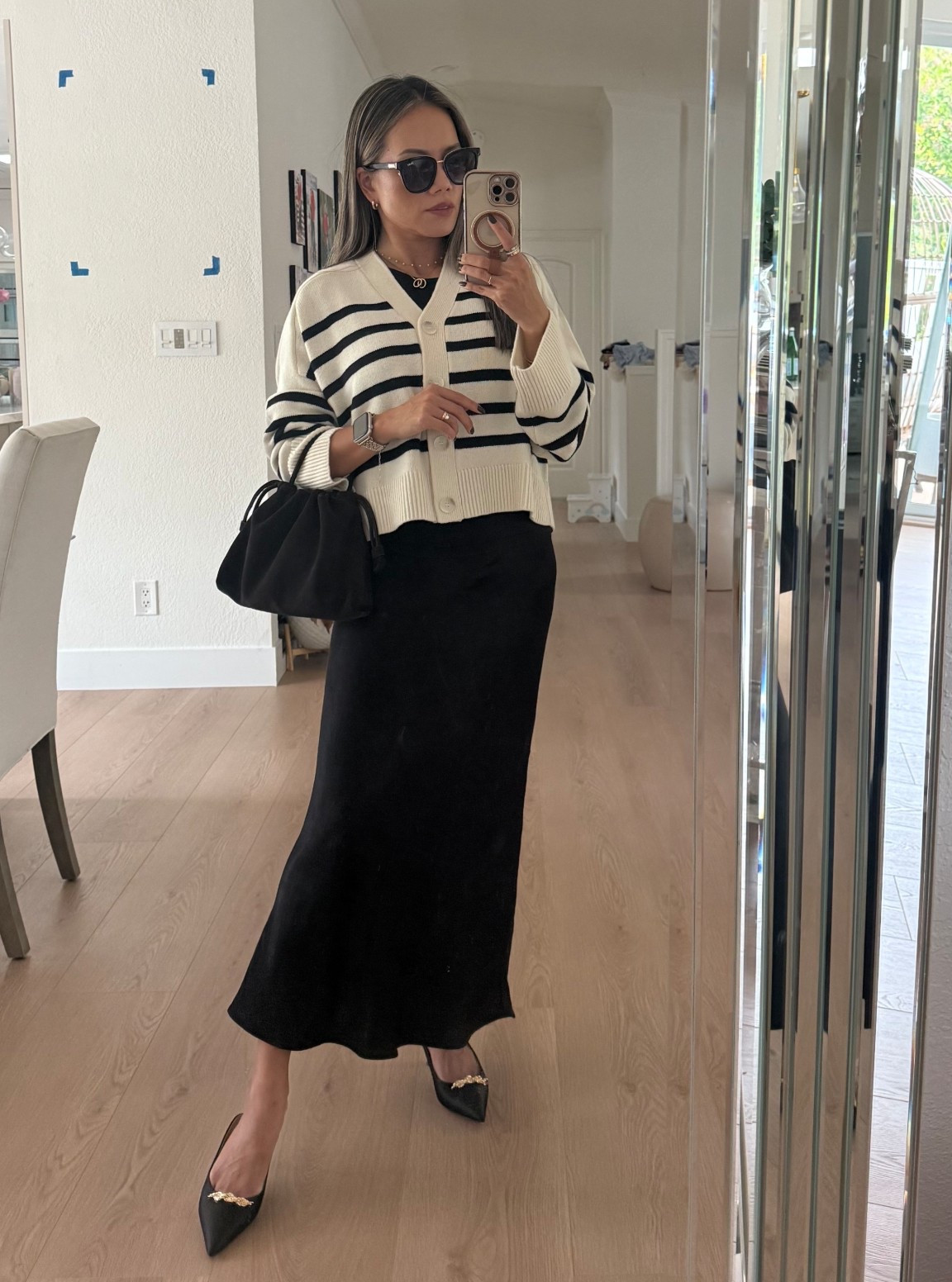 My fall go to outfit formula, maxi skirt, matching color t-shirt, wool cardigan sweater. Paired with my new little bitter chocolate brown suede bag from COS for under $150. 

#LTKItBag #LTKStyleTip