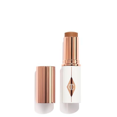 Charlotte Tilbury Unreal Skin Tint & Sheer Glow Hydrating Foundation Stick - Cream Foundation Makeup with Sheer-to-Light Coverage & a Buildable Formula - Blurring, Smoothing & Nourishing - 12.5 Tan | Amazon (US)