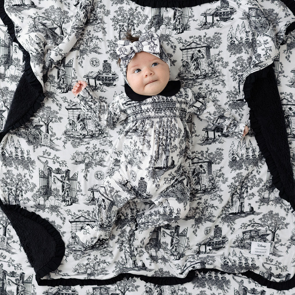 999 Happy Haunts White Snap Disney The Haunted Mansion Toile Footie Smocked Ruffled One Piece | P... | Posh Peanut