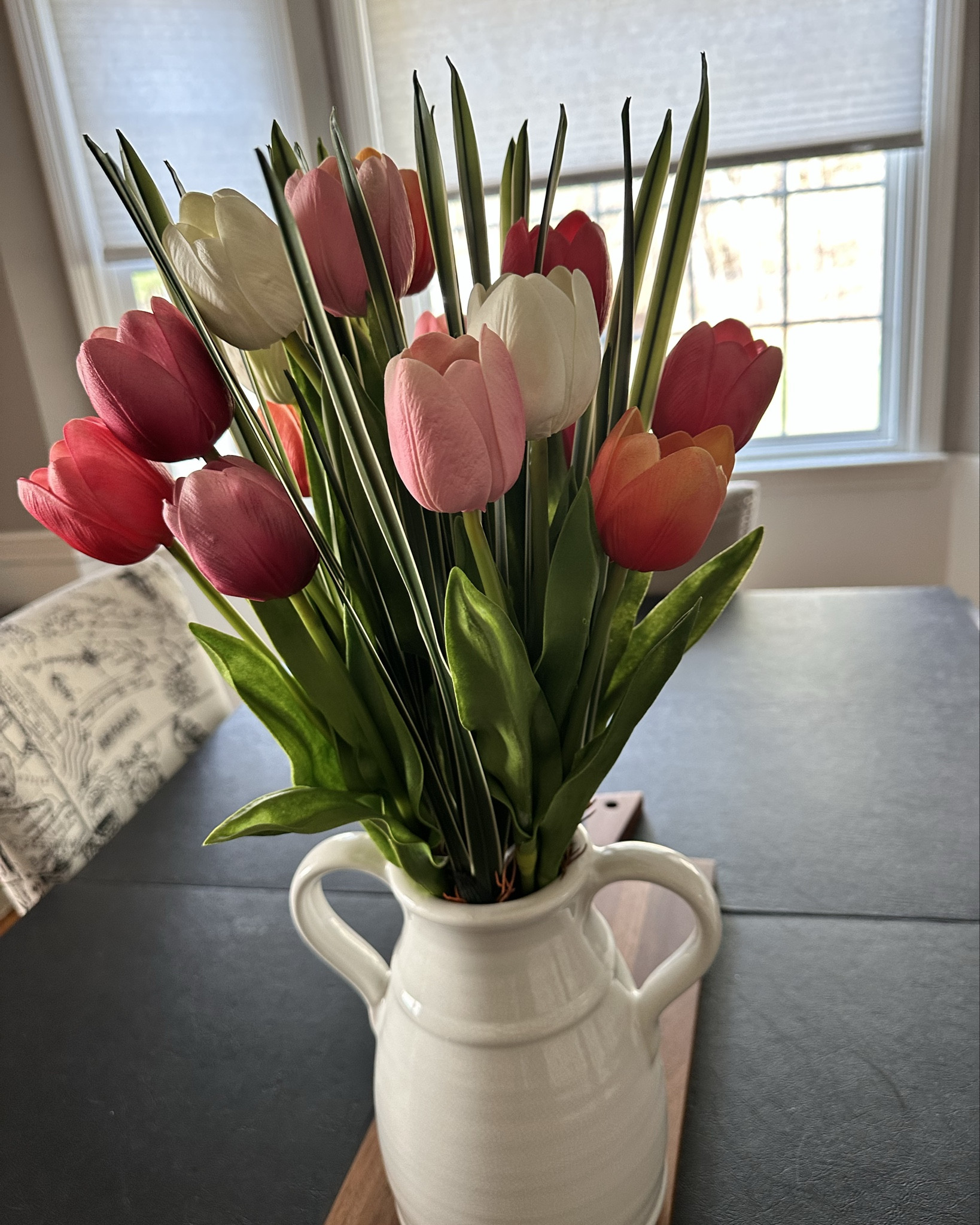 Pulled these out for spring and forgot how good they actually look ! I got them at Costco on clearance last year (with the vase!)…still one of my favorite finds

spring home decor | faux tulips arrangement | faux greenery stems | vase styling ideas | simple spring refresh

#SpringDecor
#LTKHome
#HomeRefresh
#VaseStyling
#SeasonalDecor

#LTKSaleAlert #LTKHome #LTKSeasonal