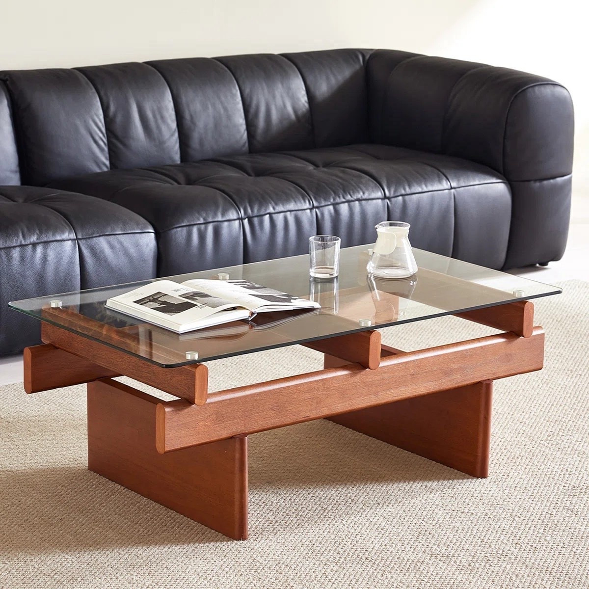 Inspired by mid-century modern design, the Glass Coffee Table with a Solid Wood Walnut Frame pairs warm natural wood with a sleek tempered glass top for a look that’s timeless, airy, and effortlessly sophisticated. The clean lines create a striking balance between craftsmanship and modern simplicity. ON SALE and under $300.

Keywords:

* glass coffee table
* solid wood coffee table
* walnut coffee table
* mid-century modern coffee table
* tempered glass coffee table
* rectangular coffee table
* modern coffee table
* living room coffee table
* minimalist coffee table
* Scandinavian-inspired furniture
* organic modern coffee table
* contemporary coffee table
* designer coffee table
* natural wood furniture
* walnut living room furniture
* architectural furniture
* timeless home décor
* elegant coffee table
* modern living room furniture

#LTKSaleAlert #LTKHome #LTKSeasonal