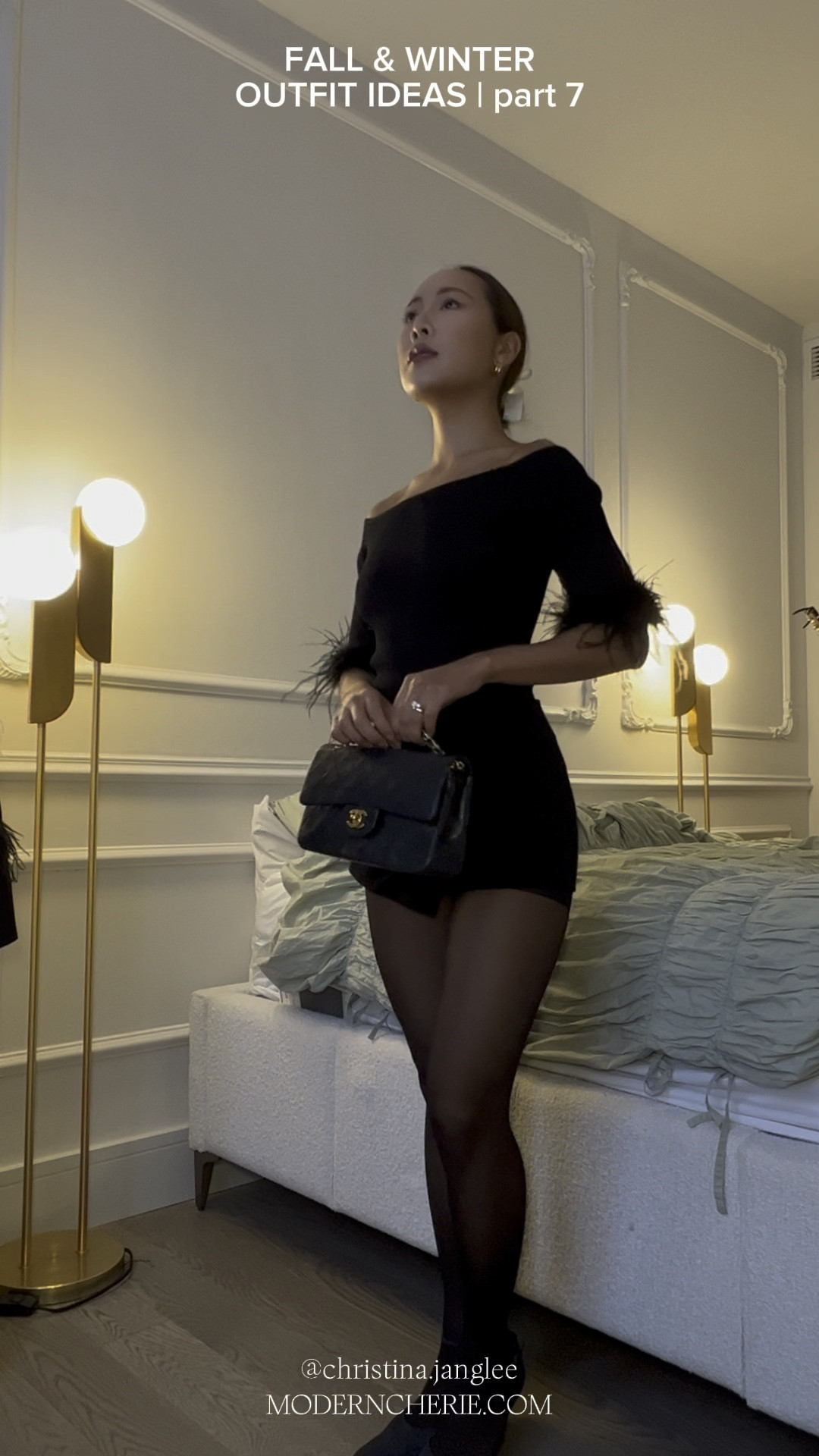Classy dinner date outfit Inspo | black feather top, mini skort, black tights, classic Chanel flap bag, Chanel hair accessory #dinnerdate #chanel