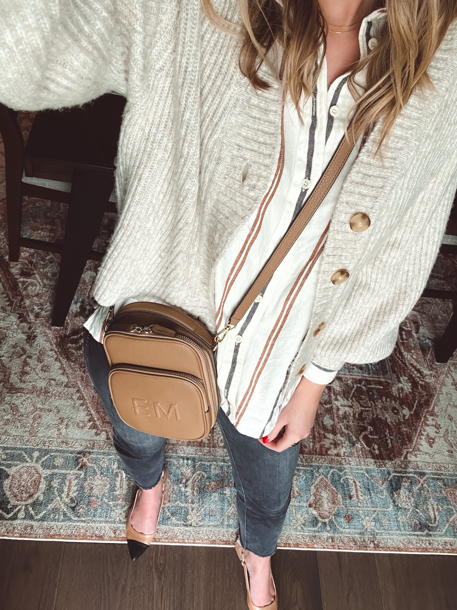 Striped shirt, embossed leather bag, captoe sling backs, faded black jeans 

#LTKsalealert #LTKworkwear