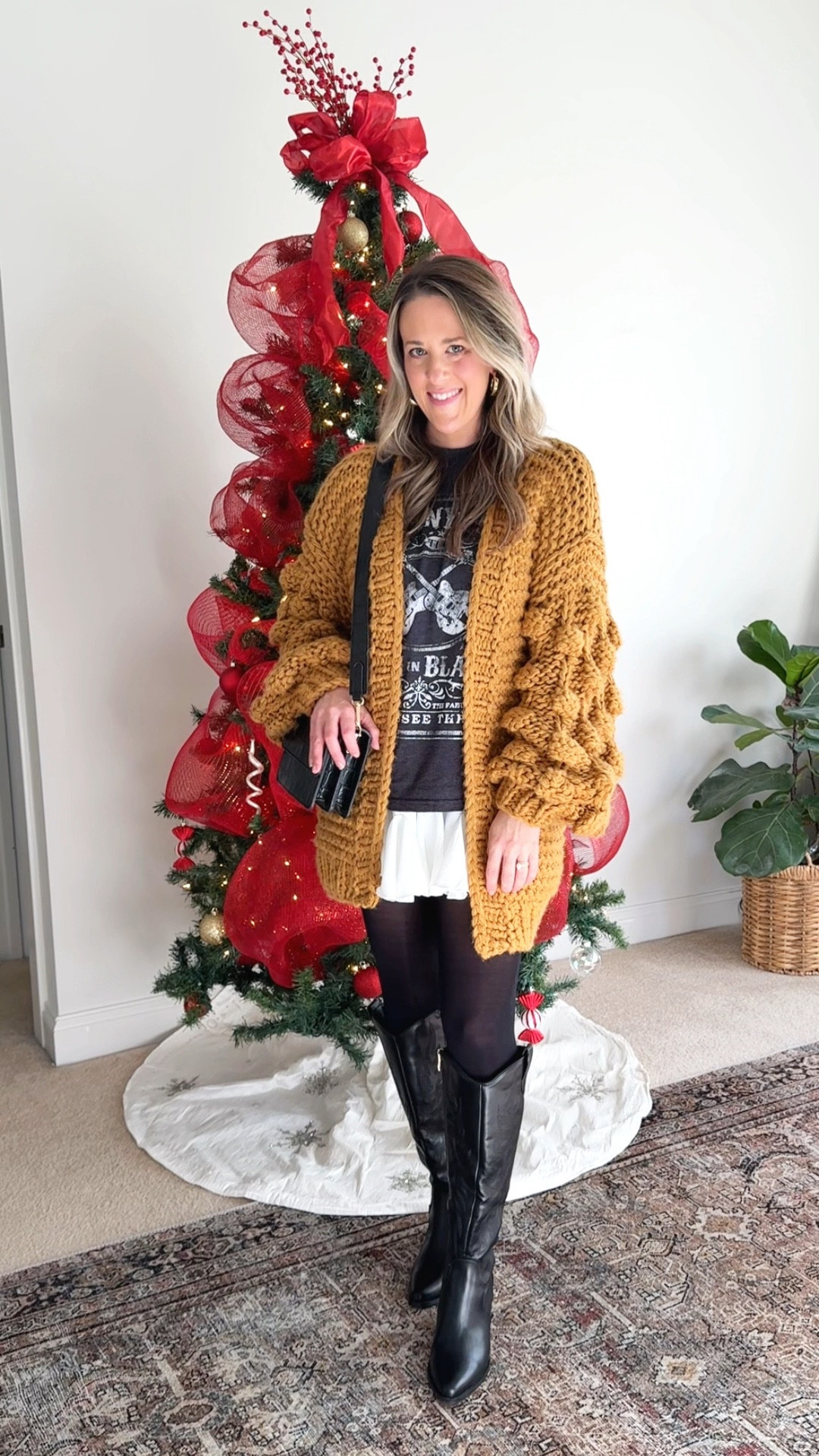 This outfit was so fun to put together. Perfect for a girls day, holiday shopping or dinner with the family. 

Cardigan: Chicwish - S
Graphic Tee: Target’s men’s section - M
Skirt: Amazon Find - S 
Tights - these are old but I’m linking similar
Cowboy Boots: Amazon Find- fit TTS
Black Purse: Amazon

Casual Mom Outfit | Styled Skater Skirt | Pleated skirt | Amazon white skirt | oversized cardigan | Amazon cowboy boots 

#LTKWatchNow #LTKStyleTip #LTKFindsUnder50