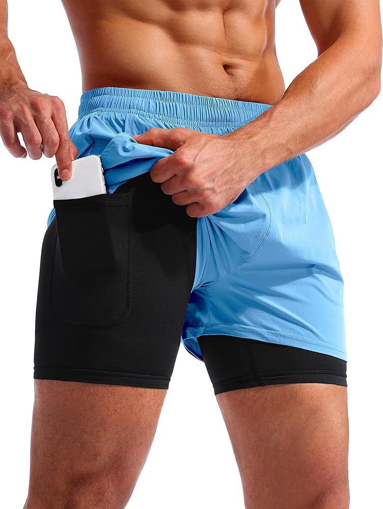 Pudolla Men’s 2 in 1 Running Shorts 5" Quick Dry Gym Athletic Workout Shorts for Men with Phone... | Amazon (US)