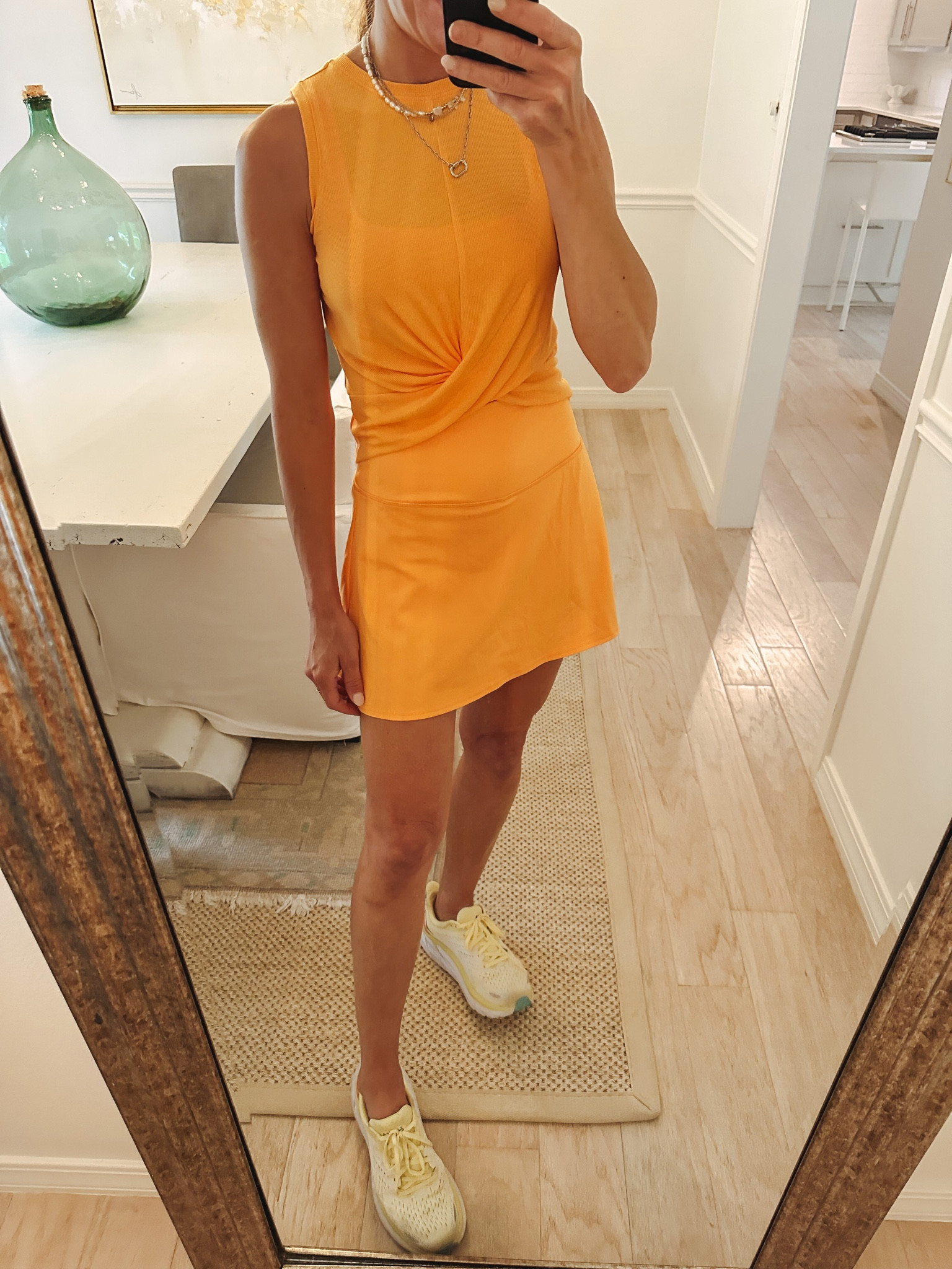 Target $25 & under athletic wear finds. Love the twist front ribbed shirt and athletic skort. Has built in shorts with pockets for tennis or pickleball or to hold your phone on a walk. Wearing the matching seamless tank underneath the top. All items come in lots of other colors. I’m really into the orange right now! 
Target workout outfit 
Target mom outfit target summer workout 

#LTKstyletip #LTKunder50 #LTKfit