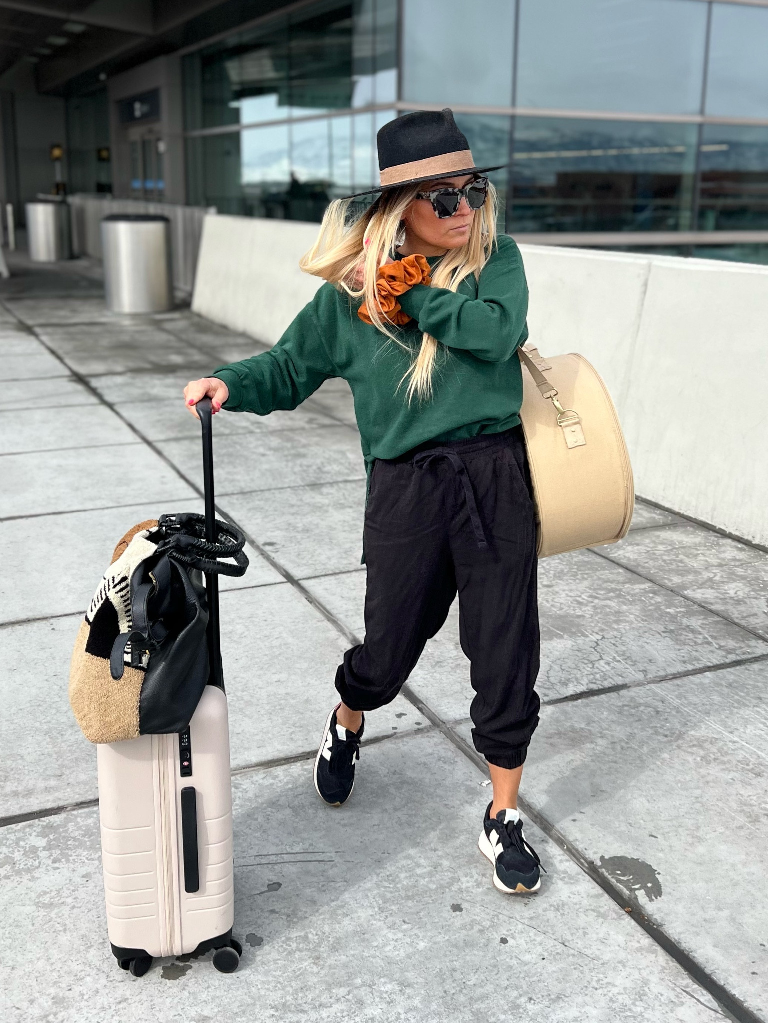 Such an easy travel look! I never go anywhere without my monos luggage! #traveloutfit #luggage 

#LTKtravel #LTKU #LTKstyletip