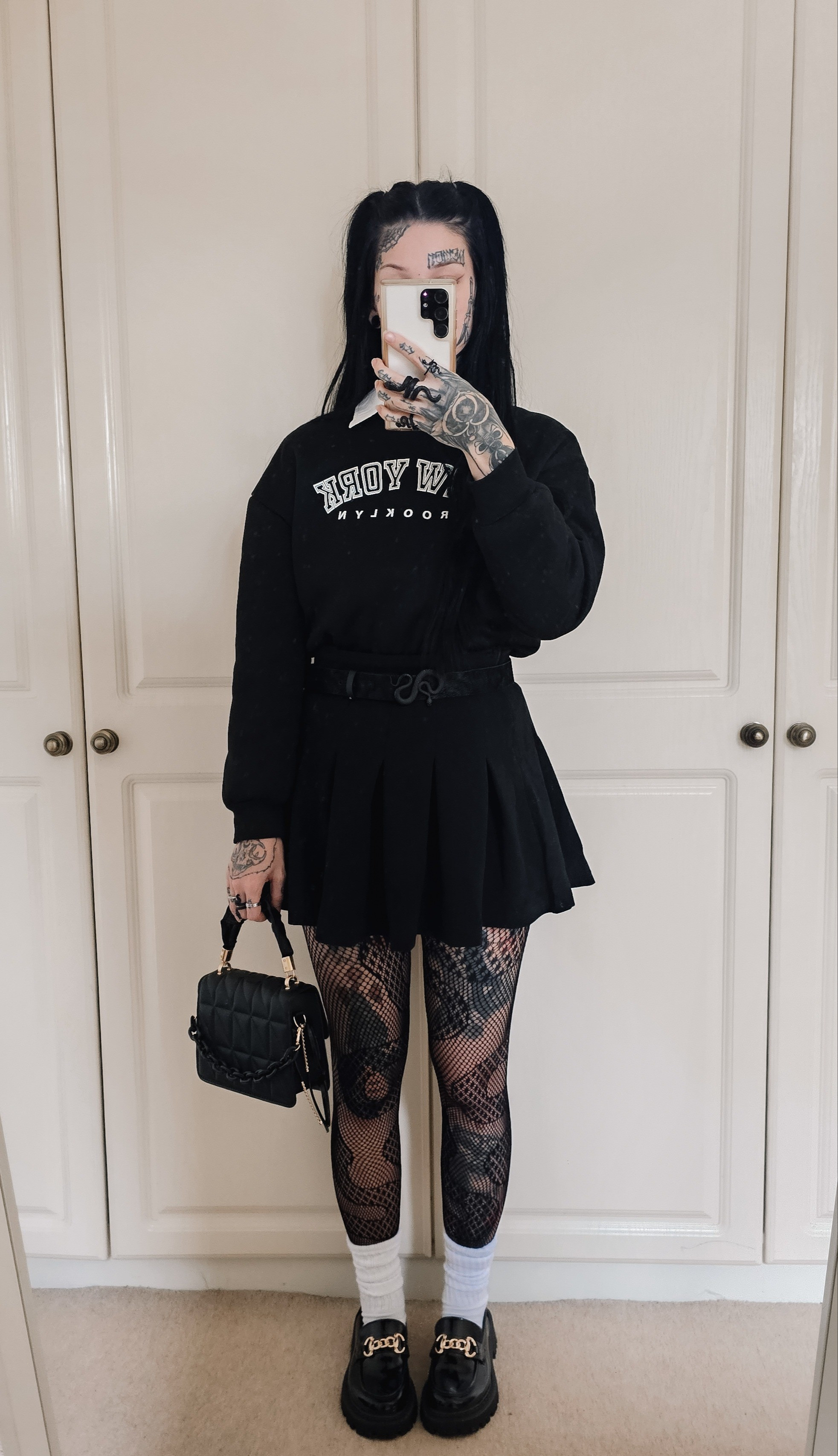 Preppy alternative / academia outfit inspo Black sweatshirt crew neckWhite button shirtBlack pleated skirtSnake fishnetsChunky loafers

#LTKfindsunder50 #LTKU #LTKworkwear