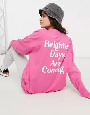 ASOS DESIGN oversized t-shirt with long sleeves 'brighter days are coming' in pink | ASOS (Global)