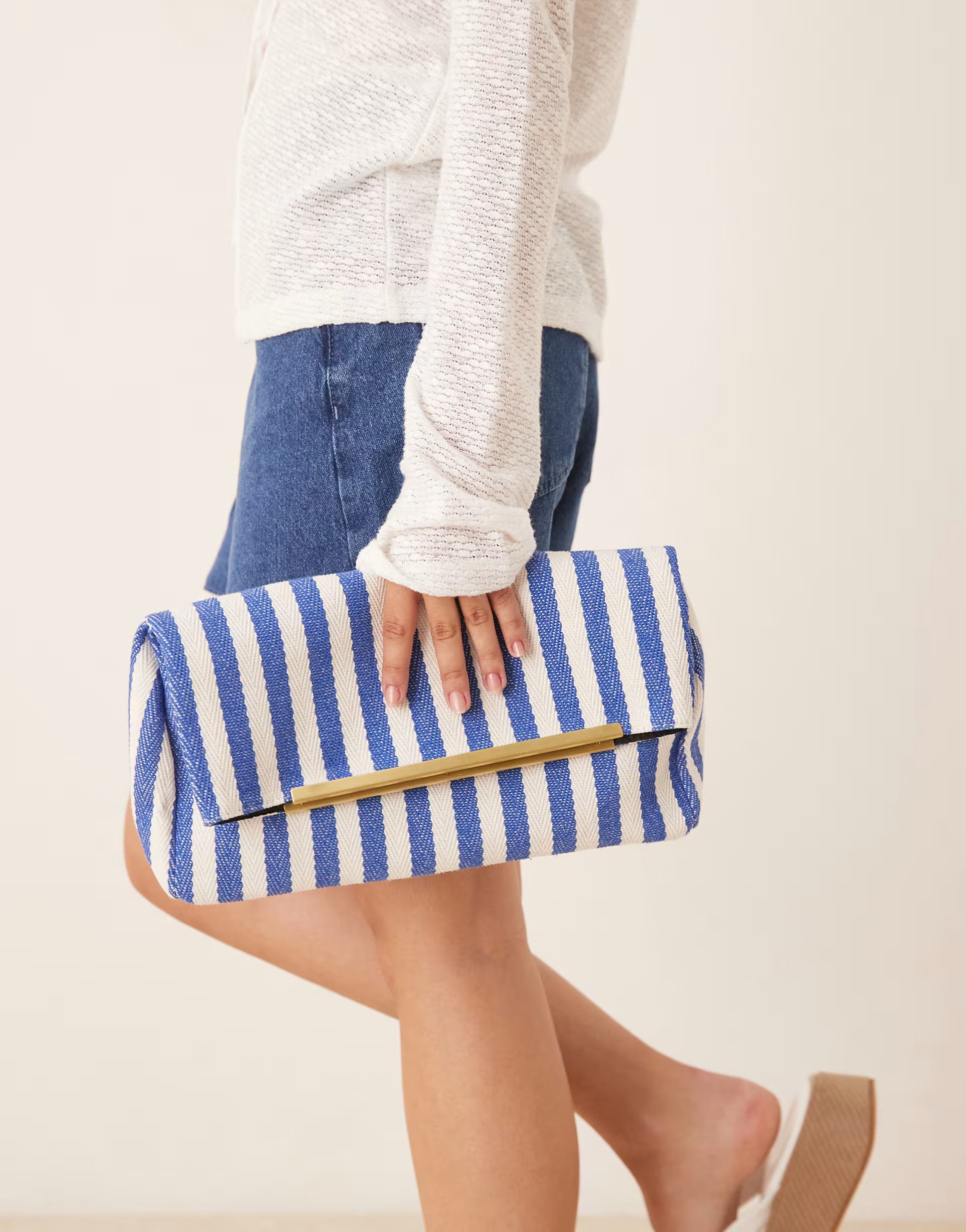 ASOS DESIGN woven foldover clutch bag with bar detail in blue stripe | ASOS | ASOS (Global)