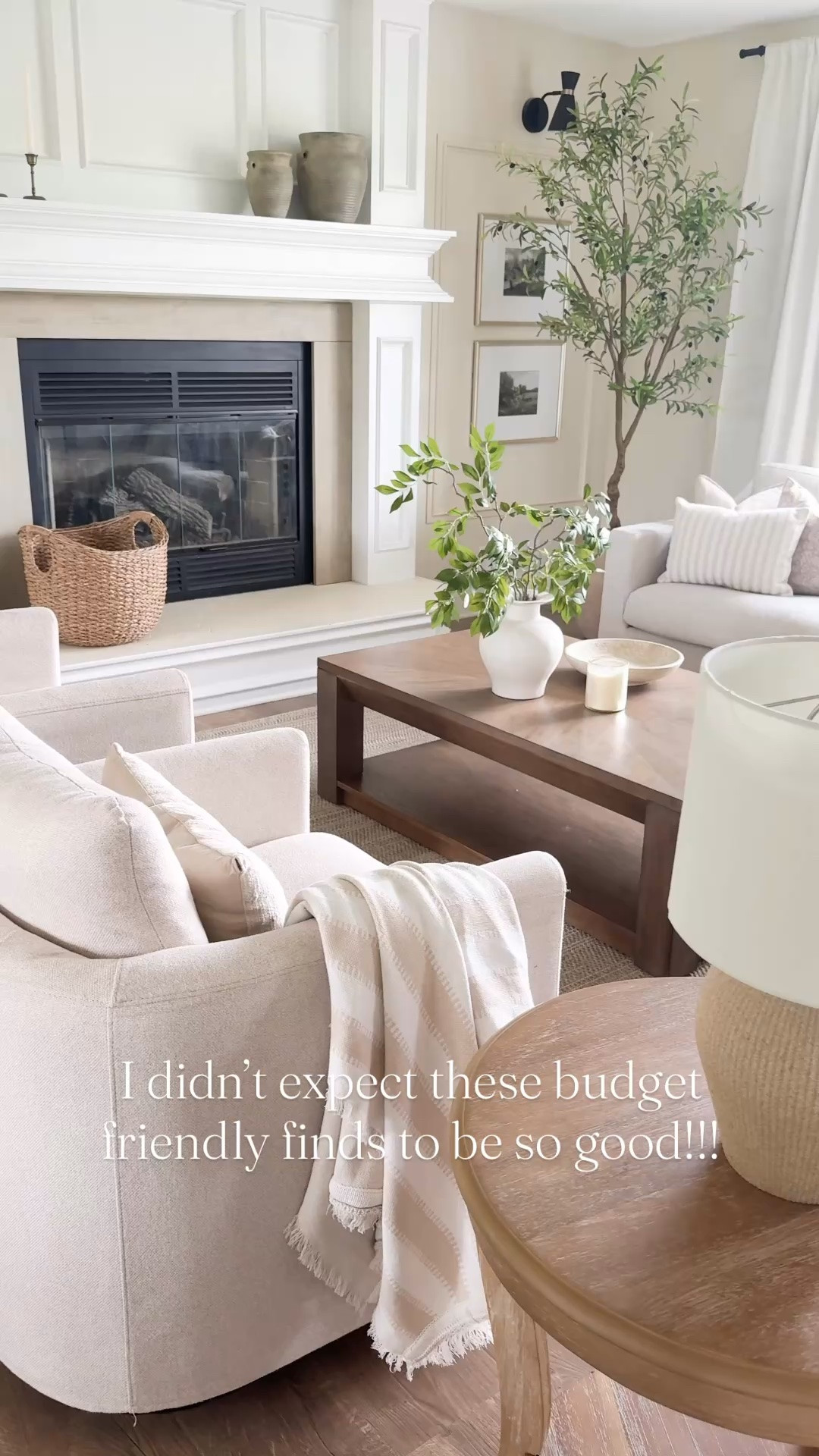Budget friendly finds that are all 10/10!

Living room, sofa, couch, area rug, neutral rug, end table, table lamp, nightstand, accent cabinet, wall art, landscape art, kitchen table, dining table