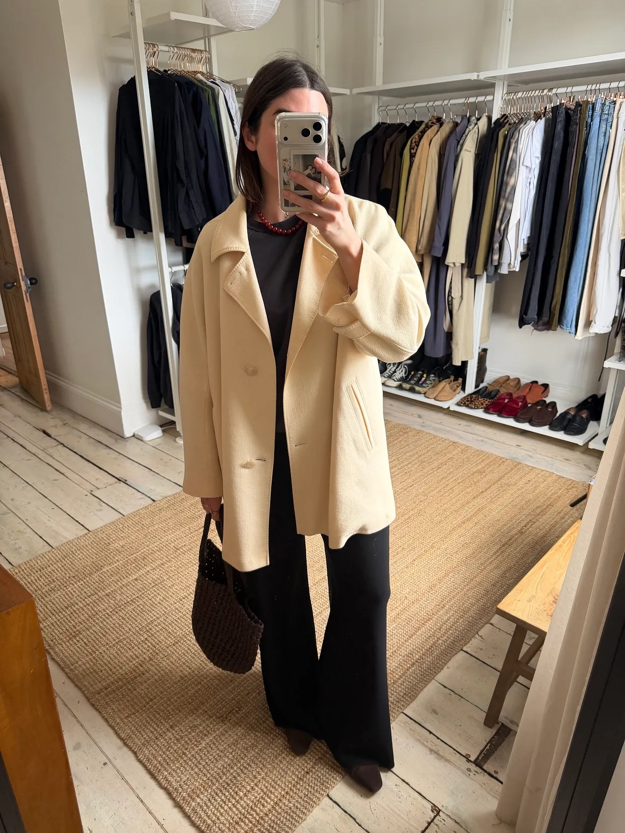 Simple spring ootd styling a vintage neutral jacket with an all black base and my bag obsession, this secondhand The Row bag. 

 #LTKspring #LTKstyletip