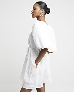 White belted puff sleeve swing mini dress | River Island UK & IE