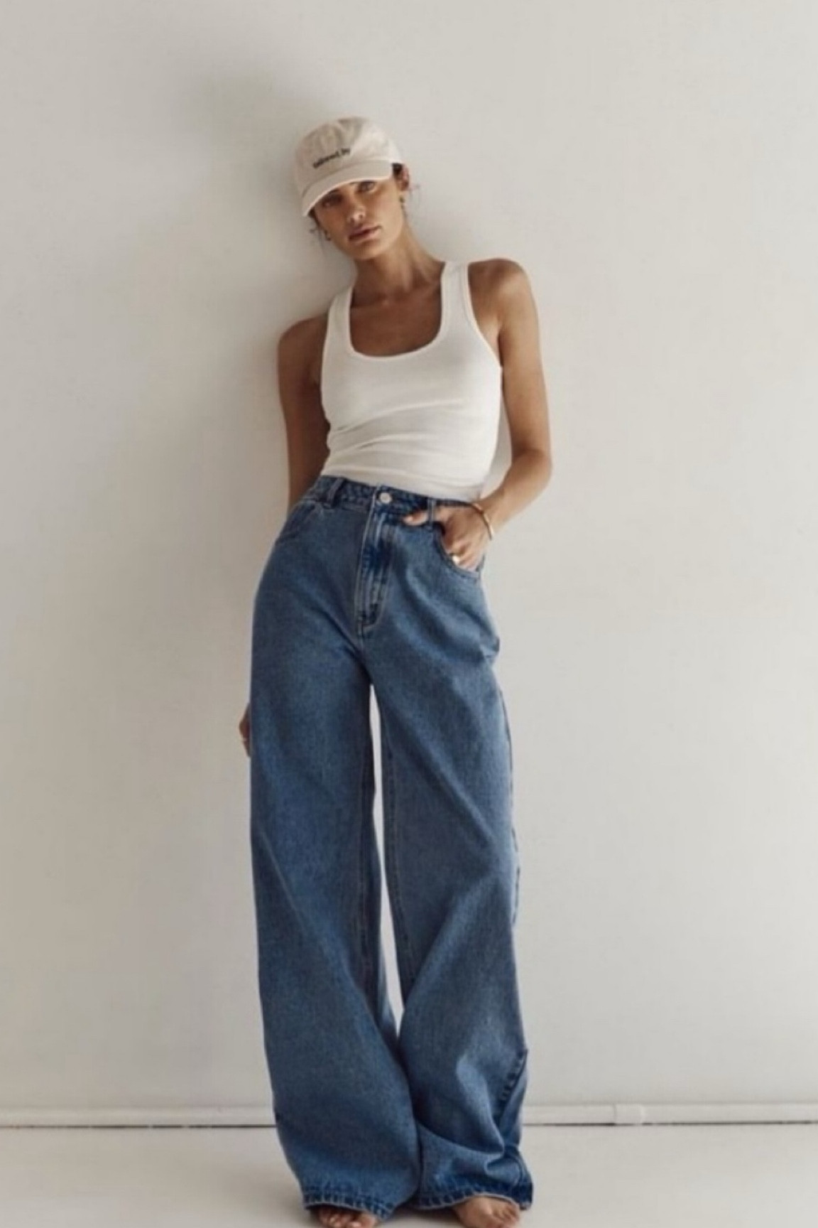 White tank top
Loose fit denim jeans
Baggy jeans 
Baseball cap 
Gold earrings 
Birkenstocks 
Spring outfits 
Easy outfits 
Casual outfits 
Abercrombie jeans 
Spring ootd

#springoutfit #styletipsforwomen #capsulewardrobe #springoutfitideas #wheretoshop #howtostyleoutfits #springlook #abercrombiejeans #abercrombie #capsulewardrobeoutfits #capsulecloset #comfychic
#styleguideoftheweek #outfits #pinterestgirl #unchoutfitideas #whatimwearing #denimoutfits #casualchicoutfit
#letsgetdressed #swipe #2024fashion
#Itkstyletip