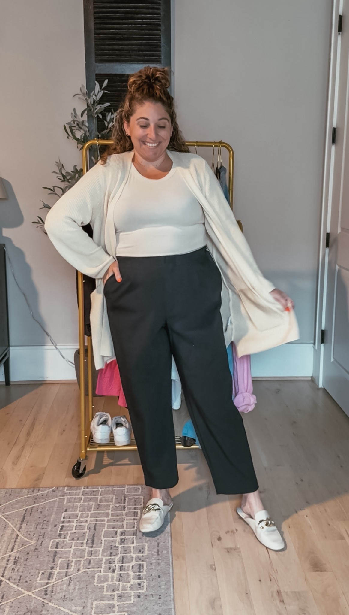 Day 9/10 of teacher outfits, all built from a rack of clothes that I think are must haves in every teacher wardrobe! These black dress pants are teacher perfection! If your school is more casual, you can sub for black denim! While this outfit is more “dressy” it is still just as comfortable as the other looks! 
Tank L / Cardigan L / Dress pants 16 (I always size up one in my dress pants) / Mules tts 

#LTKStyleTip #LTKWorkwear #LTKMidsize