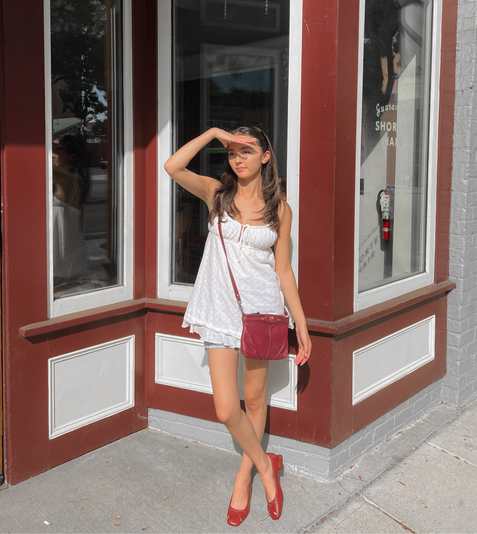 princess polly code: ANYA20
size: 2
shoes size: 6
height: 5’3

white baby doll mini dress denim shorts red ballet flats red coach bag black cat eye sunglasses


