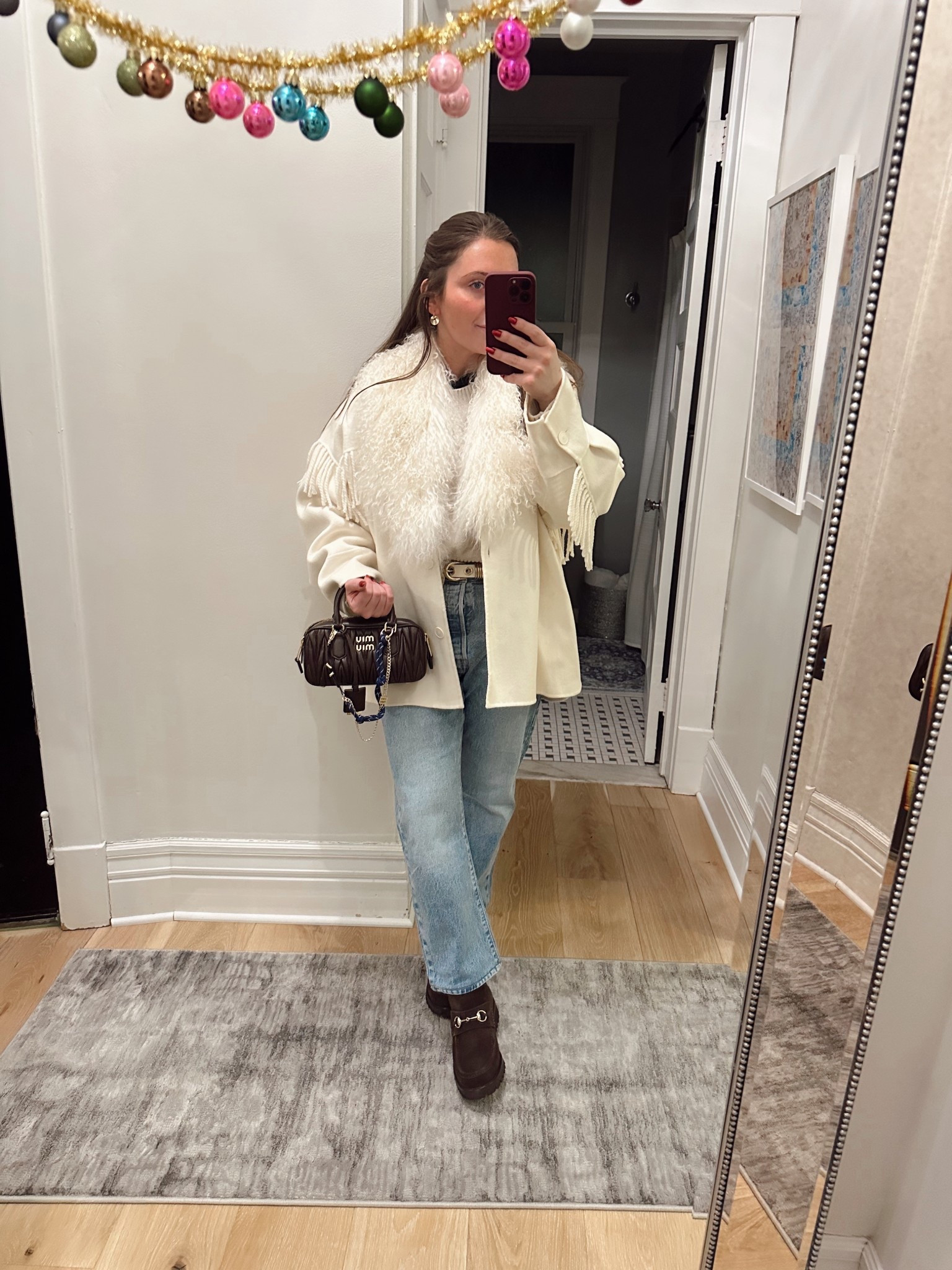 ✨Winter chic with a fun twist✨
Wore my Sandro wool fringe jacket with classic Levi’s, dehanche belt, Gucci horsebit loafers, and my favorite brown Miu Miu bag. I added a Mongolian fur collar to make the jacket feel extra festive and elevated for the season ❄️🤍
Linked a few similar jackets plus options you can easily add a fur collar to for the same cozy-luxe look!

winter outfit • casual winter outfit • holiday casual style • fringe jacket • wool jacket outfit • fur collar outfit • Levi jeans outfit • Gucci loafers outfit • Miu Miu bag • winter fashion inspo • cozy winter look • elevated casual outfit • holiday outfit idea

#LTKgrwm #LTKootd #LTKHoliday