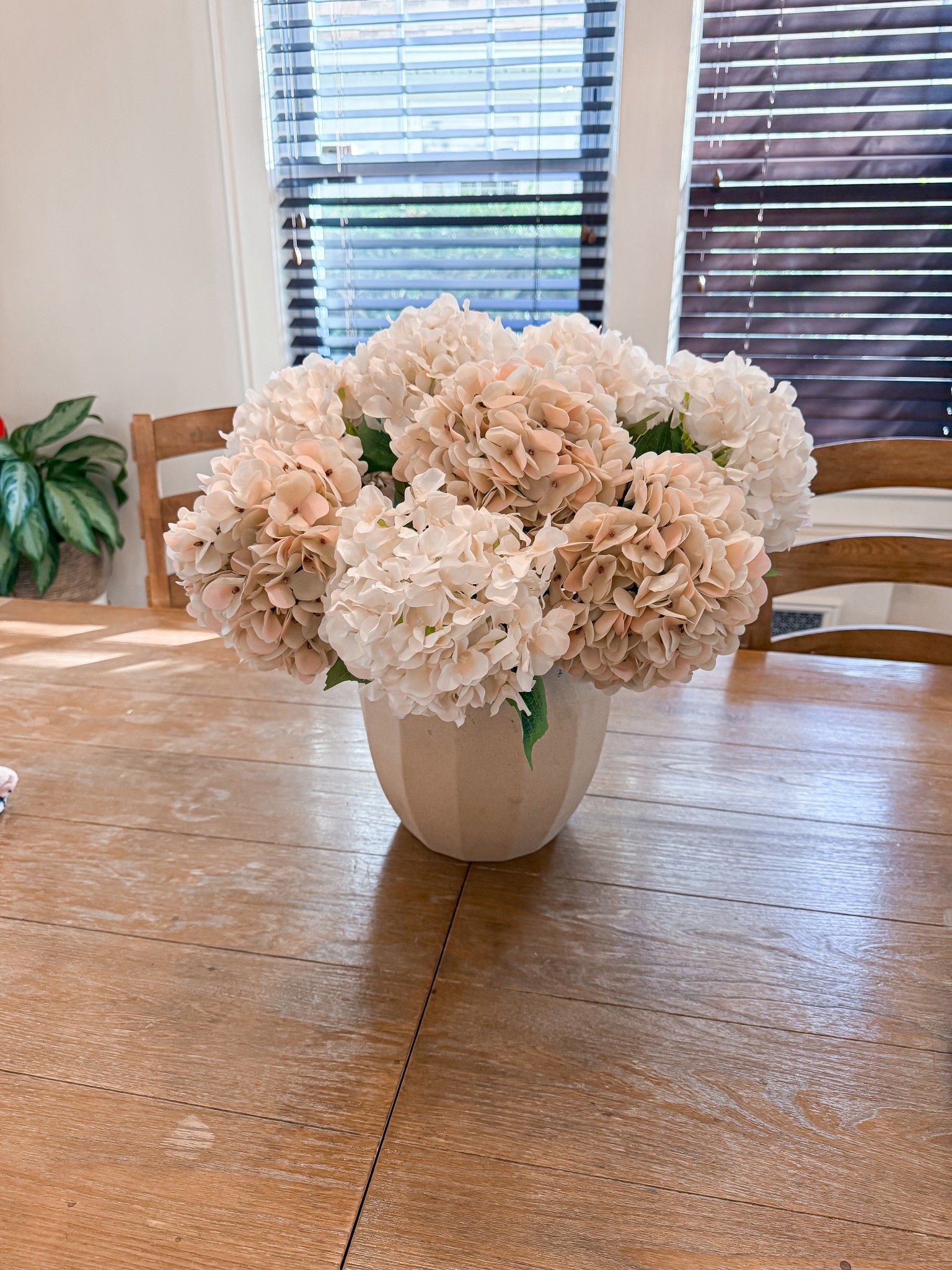 Pretty spring faux floral centerpiece. 


Hydrangeas flowers faux flowers. Spring dining room. Home decor. 

#LTKHome #LTKSeasonal