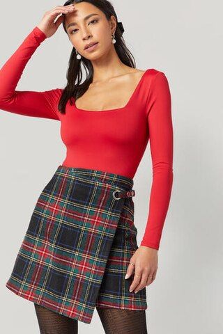 Rhea Plaid Asymmetrical Mini Skirt - francesca's | Francesca's