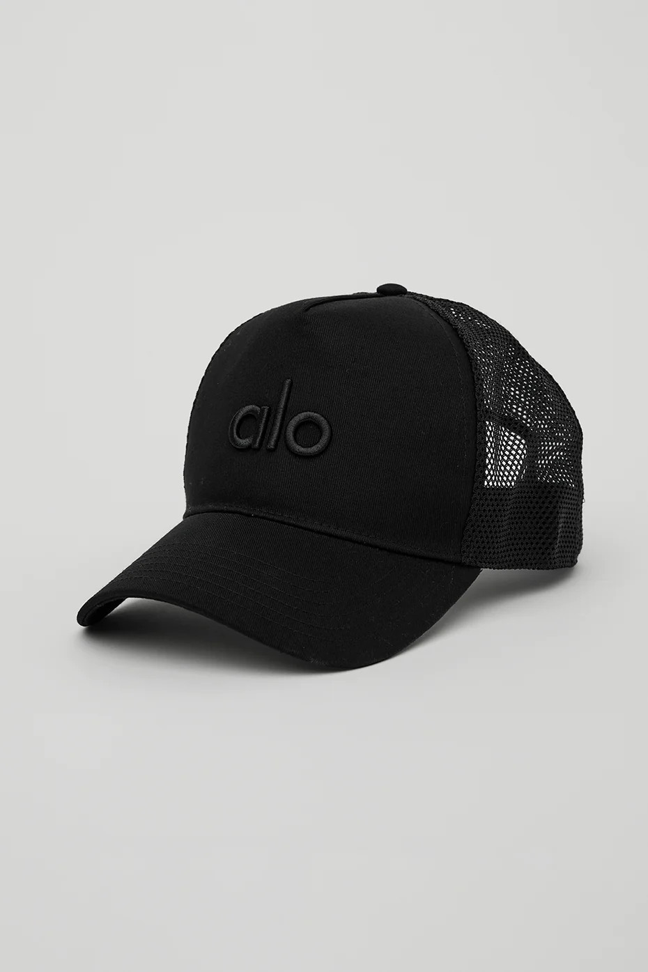 ALO | District Trucker Hat in Black | Alo Yoga (US)