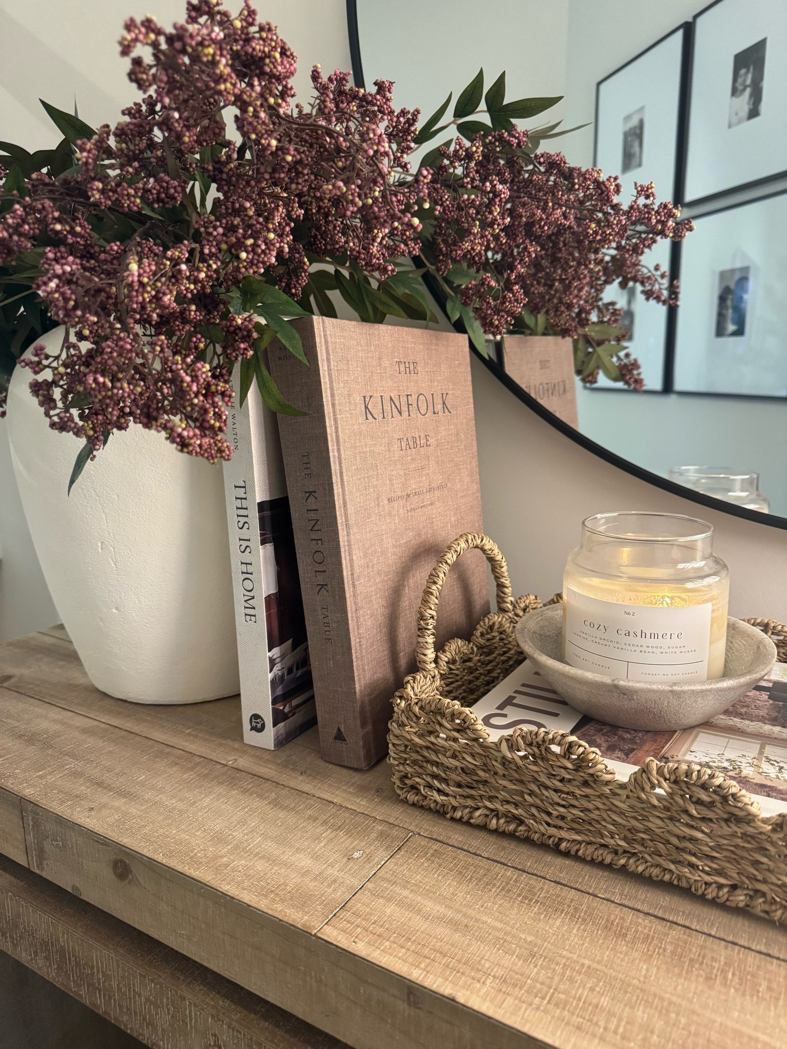 Berry stems, white vase, scallop tray, candle bowl, console table styling, coffee table books, round mirror

#LTKSeasonal #LTKHome #LTKU