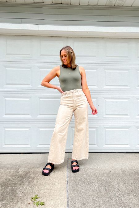 Summer outfit idea. Casual outfit idea. Nuuds bodysuit. Tank top bodysuit. Wide leg khaki jeans. 

Sizing
Bodysuit is a small.
Jeans are from Zara and cannot be linked, but I linked similar options.
Go up a full size in the sandals. I'm in a 10, from my usual size 9.

#LTKstyletip #LTKunder100 #LTKunder50