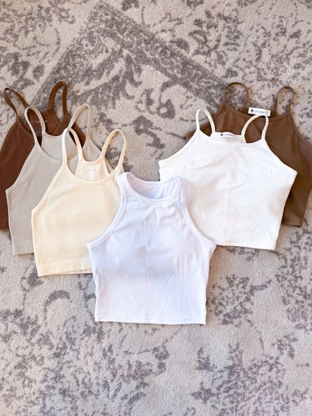 I didn’t know I could love a tank so much!

These are SO GOOD! Depending on how much support you need some offer a built-in-bra and thicker straps. Great to layer under sweatshirts, overalls, or looser fitting tops. 

Long and crop styles available! Fit true to size. 

#LTKActive #LTKFitness #LTKFindsUnder50