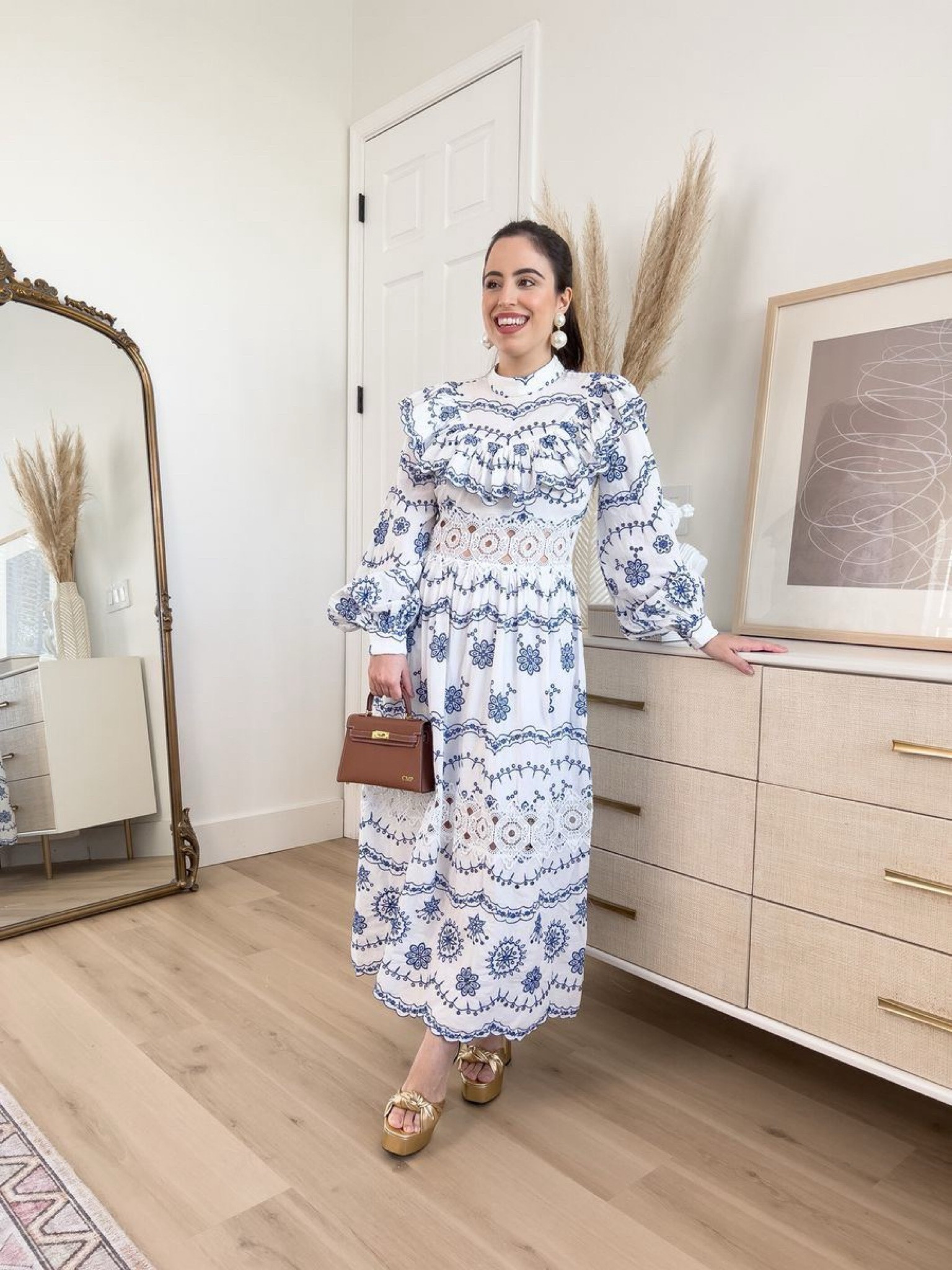 Look at this fancy midi dress that I wore! It is amazing with its embroidered design and you can wear this to attend events and parties. I paired it with gold platform heels, pearl earrings, and a mini bag.
#springfashion #outfitinspo #petitestyle #modestlook

#LTKitbag #LTKSeasonal #LTKstyletip