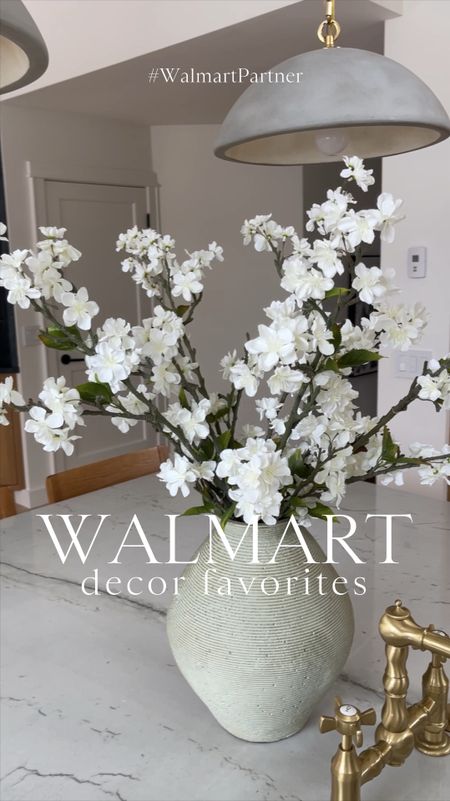 HOME \ @Walmart spring decor favorites🤍 Looooving these cream blossom stems paired with a large ceramic vase! Here I’m using 5 stems🙋🏻‍♀️ Refresh a space this season! #WalmartPartner #WalmartHome

#LTKSeasonal #LTKhome #LTKVideo
