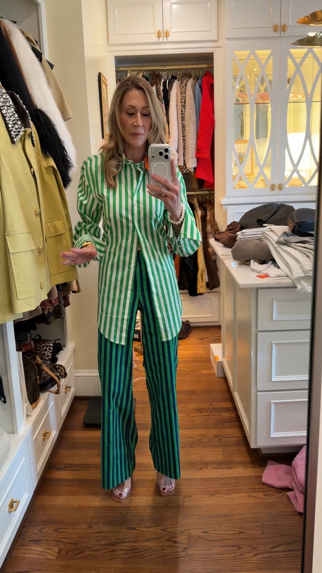 Resort style in this striped top with an open tie back and paired with striped pants.  Wearing transparent  sandals from Cult Gaia.


#LTKOver40 #LTKootd #LTKSeasonal
