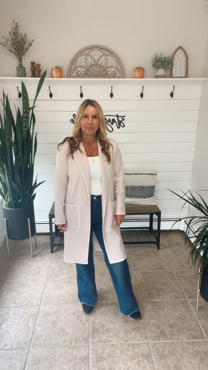 A cute date night outfit perfect for these fall weather days and nights. I’m wearing a medium in the jeans, a large in the tank and a medium in the cardigan the boots are tts. The coatigan  is currently 30% off.

#LTKFindsUnder50 #LTKOver40 #LTKVideo