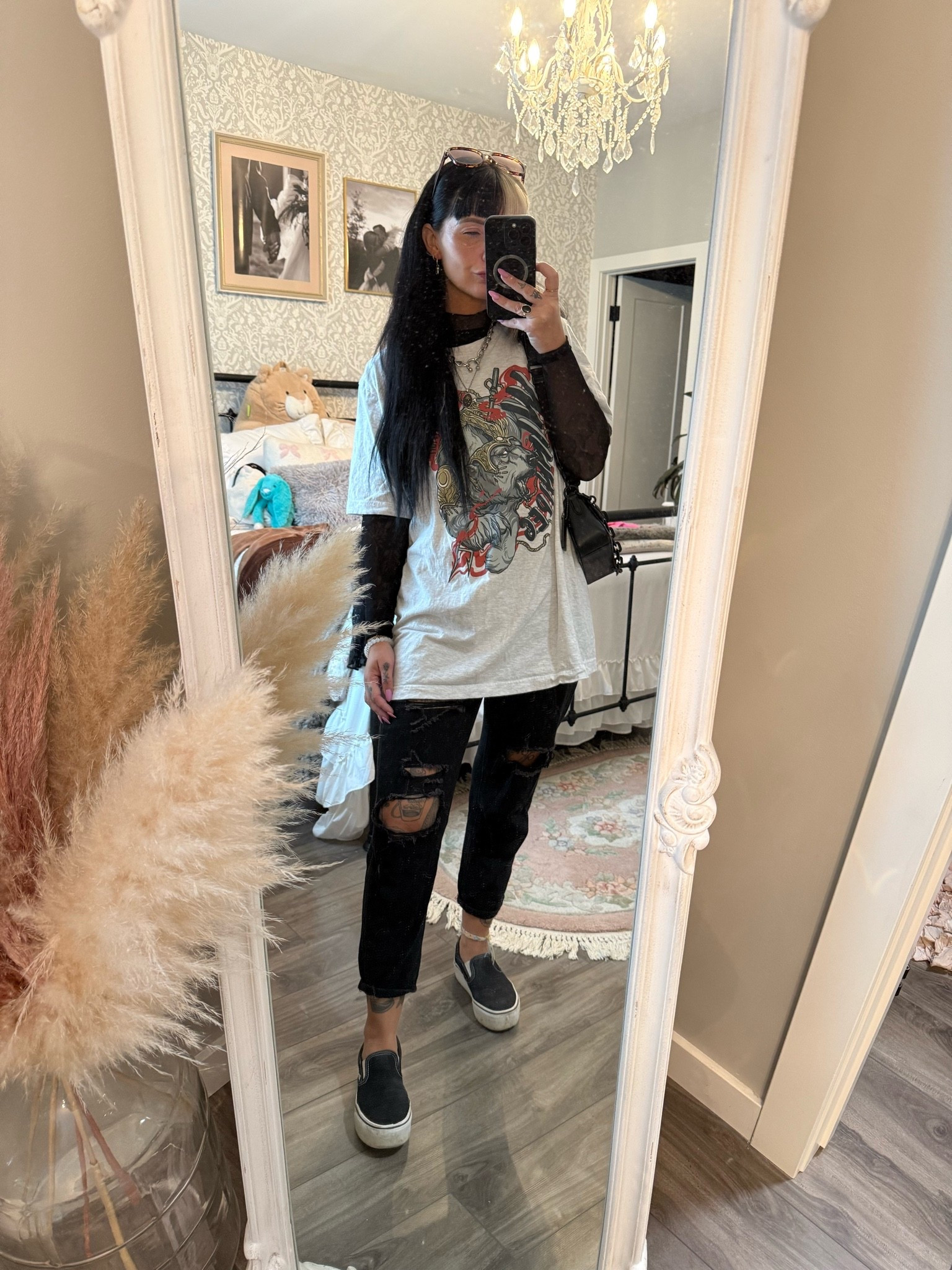 Layering long sleeve turtleneck with an oversized tee. 

Tshirt: Winnipeg tattoo convention merch
Jeans: Shein
Turtleneck: thrifted
Purse: ysl college bag
Shoes: platform slip on vans
Necklaces: chain - Temu, rose pendant - clocks and colour
Earrings: Disturbia

#LTKcanada #LTKfall #LTKsummer